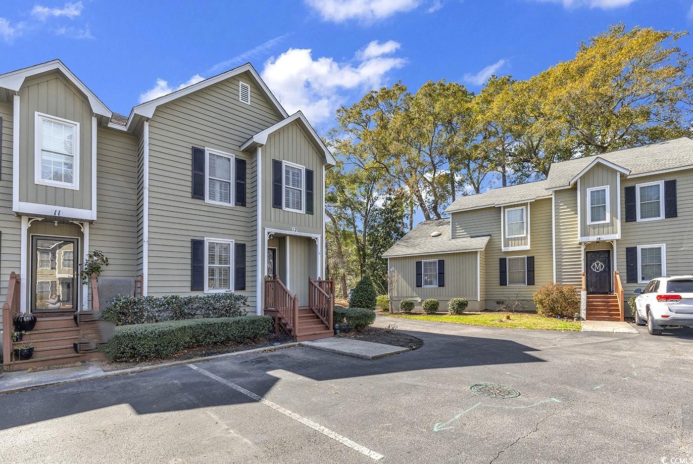 welcome to moss creek #12 in the heart of murrells inlet. this two bedroom end unit condo has just gone through an extensive renovation project consisting of brand new quartz countertops in kitchen and master bath, stainless steel appliances, floor to ceiling interior paint, all new carpeting, some new lighting/plumbing fixtures, etc. the main level flooring was installed in 2022. at that time, any subflooring that needed attention was repaired, along with the crawl space being encapsulated. the two bedrooms are on the second level along with two private bathrooms. the downstairs has a half bath, renovated kitchen, dining area and living area with a large back deck for outdoor enjoyment. please call the listing agent, or your realtor, to schedule a showing or learn more about this renovated property!