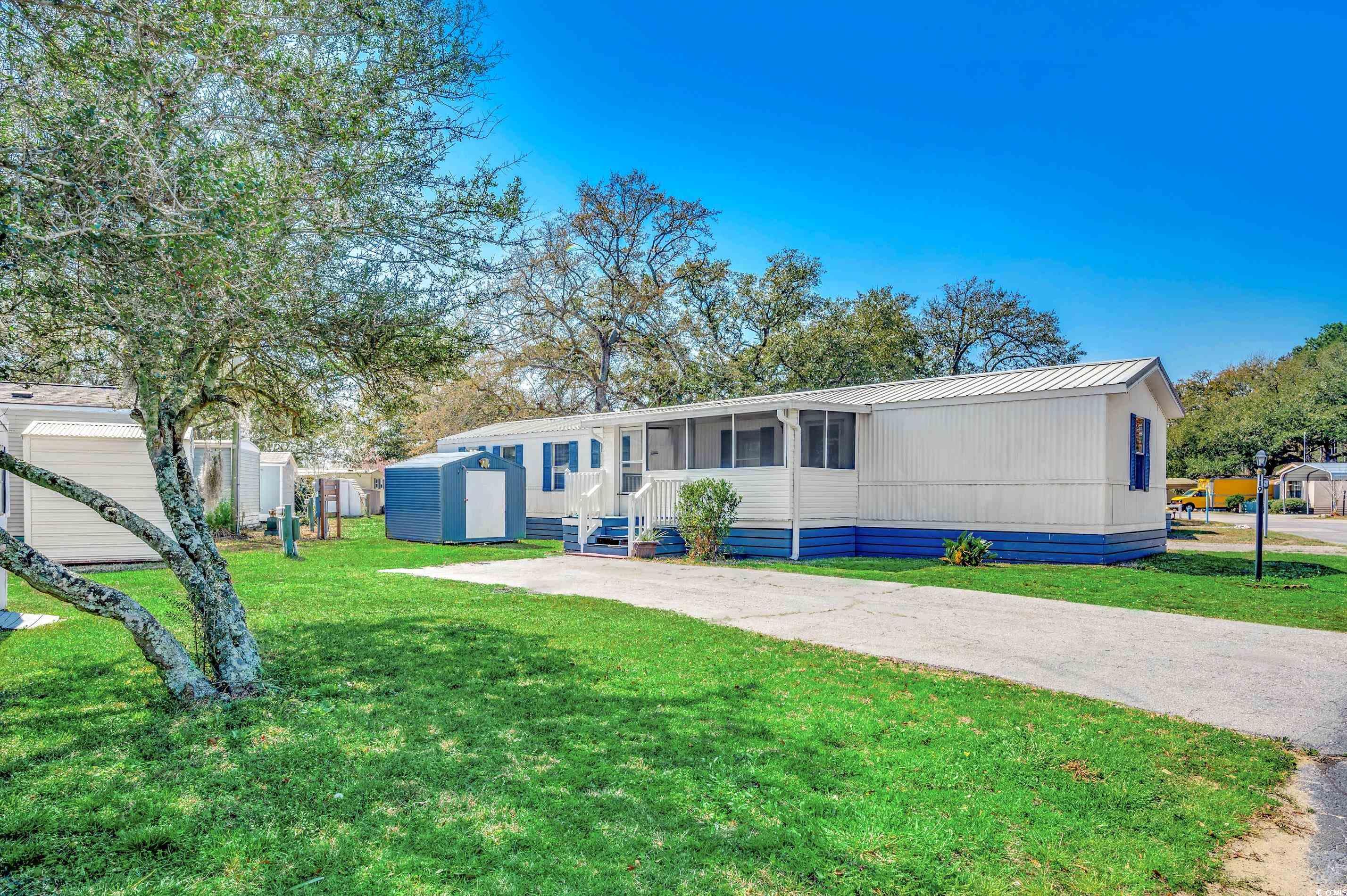 come see this lovely home located in the established 55+ community of inlet oaks village! this move-in-ready home has nautical exterior colors with a big 8x15 screened-in front porch where you can sit back and relax. this wonderful home has a split floor plan with lots of upgrades. luxury vinyl plank flooring has been installed throughout along with updated light fixtures and modern ceiling fans. the entire home has been freshly painted and the blinds have been replaced. the spacious owner's suite has two closets along with a farmhouse-style open shelving area. the large bath features dual sinks with plenty of counter space and a separate linen closet. this home has been very well maintained and the owner is even offering a home warranty for extra peace of mind. pets, golf carts, and motorcycles are allowed. this home has a durable tin roof along with a long paved driveway and an outdoor storage building for all your beach gear! this is an active community with a social club that plans activities on a regular basis. there is a resort size pool where you can do water aerobics along with a clubhouse where you can meet with friends. you will never be bored in this location! the murrells inlet marshwalk is only a few minutes away where you can go fishing, kayaking, and exotic bird watching. this area is full of delicious restaurants, boutique shops, and festivals with live music! there are several top-notch golf courses nearby along with huntington beach state park and brookgreen botanical gardens. a new concrete pier recently opened in surfside beach and garden city is always a fun place to go! some photos have been virtually staged. schedule your showing today, and please don't forget to check out the 3d tour! square footage is approximate and not guaranteed. buyer is responsible for verification.