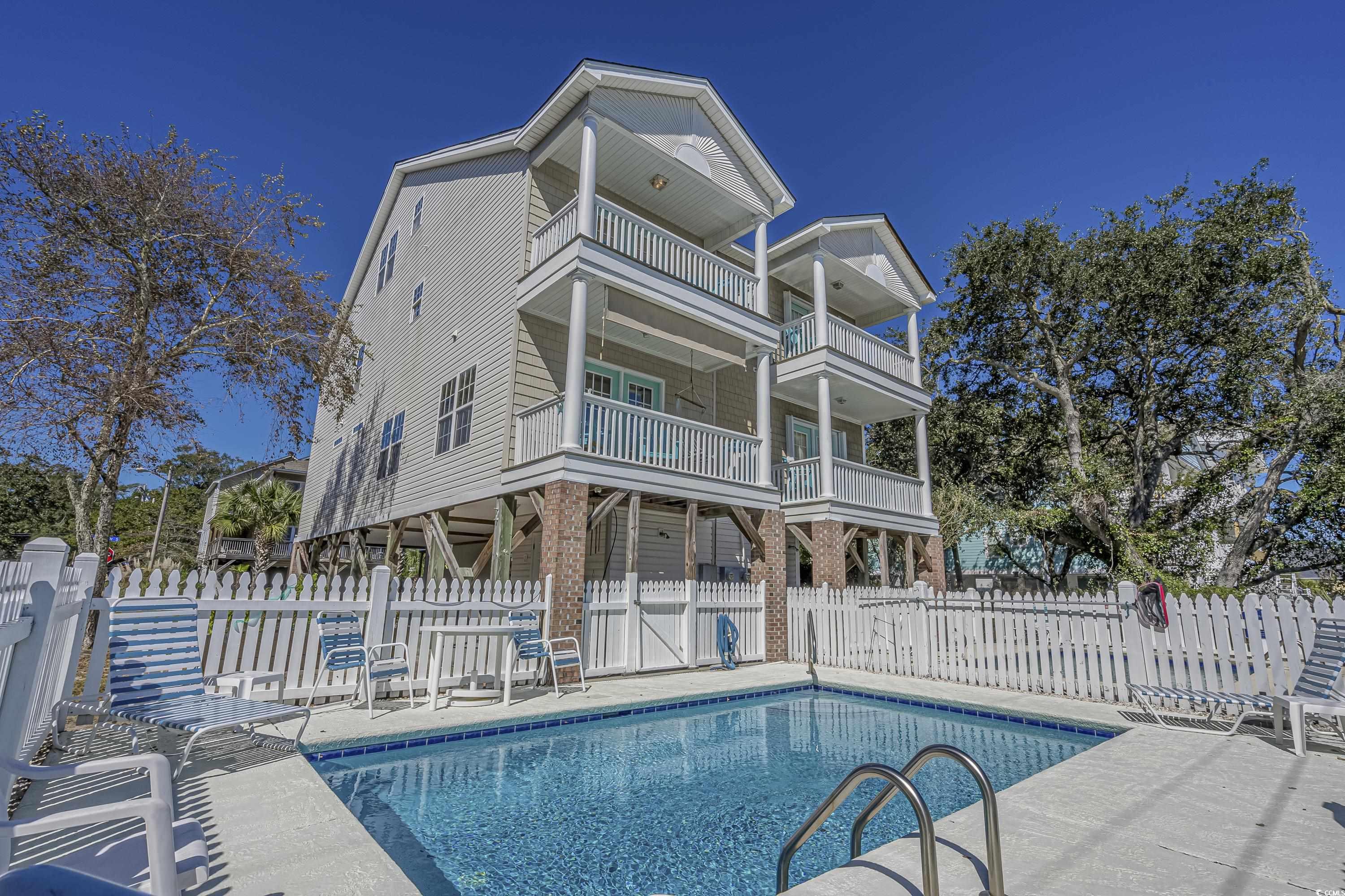 look no further! steps from the beach! a private pool! move-in ready! do not miss the amazing opportunity to own this gorgeous 5 bedrooms & 4 baths beauty at the heart of surfside beach. sold fully furnished and equipped, this great home has it all. enjoy the open floorplan concept, large bedrooms, multiple balconies and so much more. just a short walk to the beach. no hoa. the list of improvements is long: 1)the pool and deck plastered in 2020.  2) new hot water heater 2018. 3) washer, dryer, stove, refrigerator, dishwasher five years old.  4)granite countertops in kitchen.  5)updated floors in bathroom. 6) new siding in 2016.  7) new pool pump.  8) new hvac. this oasis can be used as a primary residence, a second home, a vacation rental or both!  short term and long term rentals are allowed (sleeps 14). located near shopping and fine dining, financials and medical facilities.