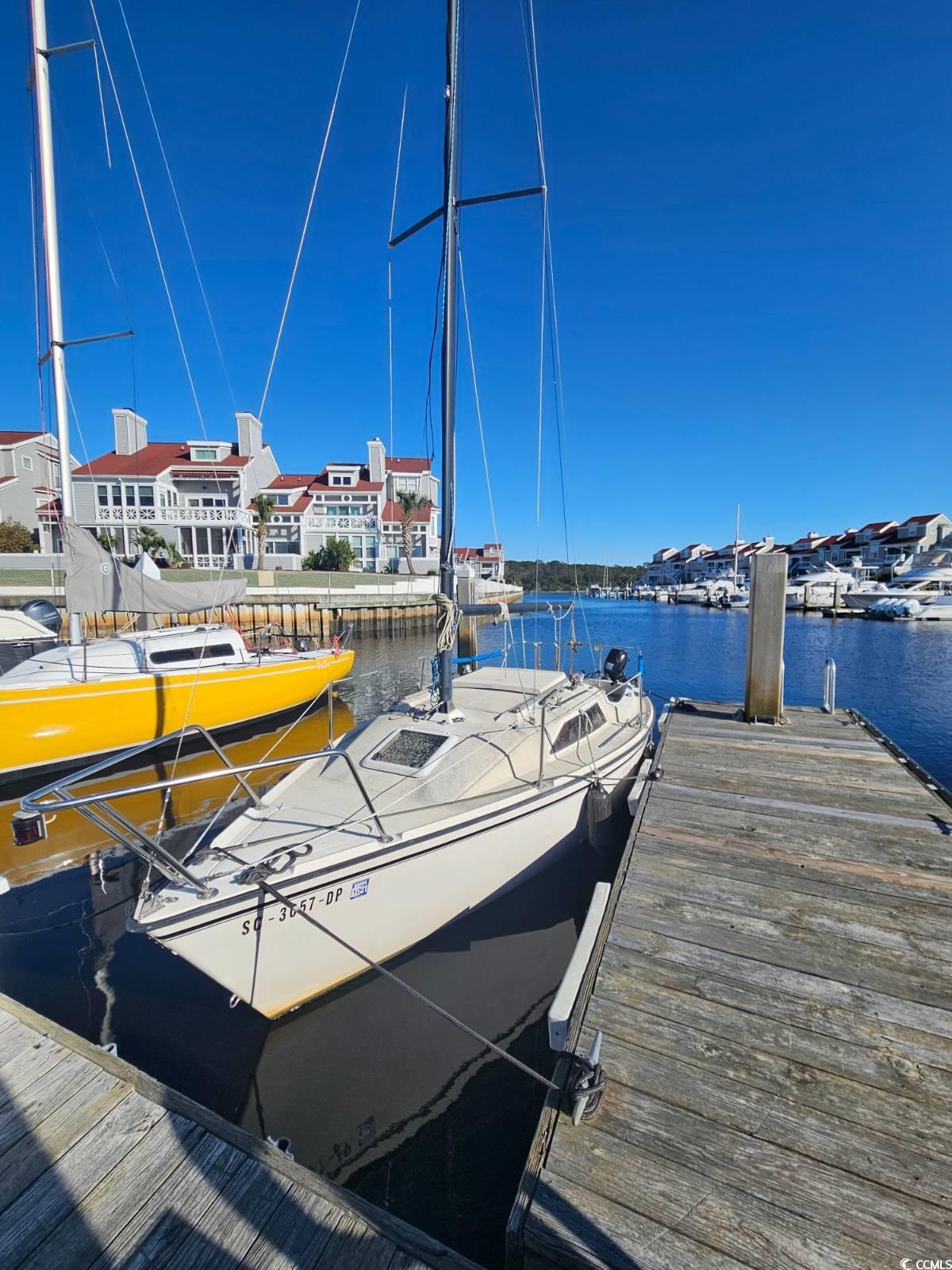 this 38 ft.  deeded boat slip is nestled within the gated marina community of mariners pointe along the intracoastal waterway. offering access to the atlantic ocean without any bridge restrictions, it presents an ideal location for boating enthusiasts. the marina boasts an array of amenities including a clubhouse with a bar/lounge, hot tubs, showers, tennis court, and swimming pool, as well as the convenience of an on-site dock master and pump-out station. with its prime location, ample facilities, and competitive pricing, this slip represents a compelling opportunity that is sure to be snapped up quickly!