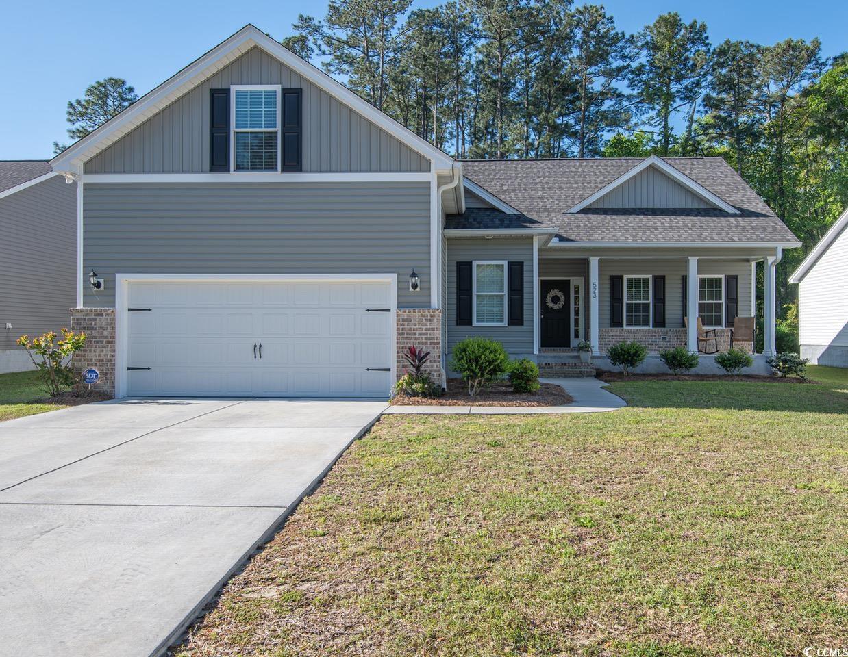 updated photos!  meticulously maintained home in a quiet location. just inside of harbor club on winyah bay. the dogwood plan is a 1 1/2 level home, 4br 3 bath, with a 2-car garage. this open floor plan features a spacious kitchen overlooking the great room. enjoy a beautiful view of the spectacular oak trees and azaleas from the front and the winyah bay from the back porch. relax on the screened in porch overlooking a nice sized back yard, bordered in the rear with pines for privacy. you can even watch the shrimp boats on the waterway from the backporch! neutral colors throughout and luxury vinyl flooring throughout the downstairs.