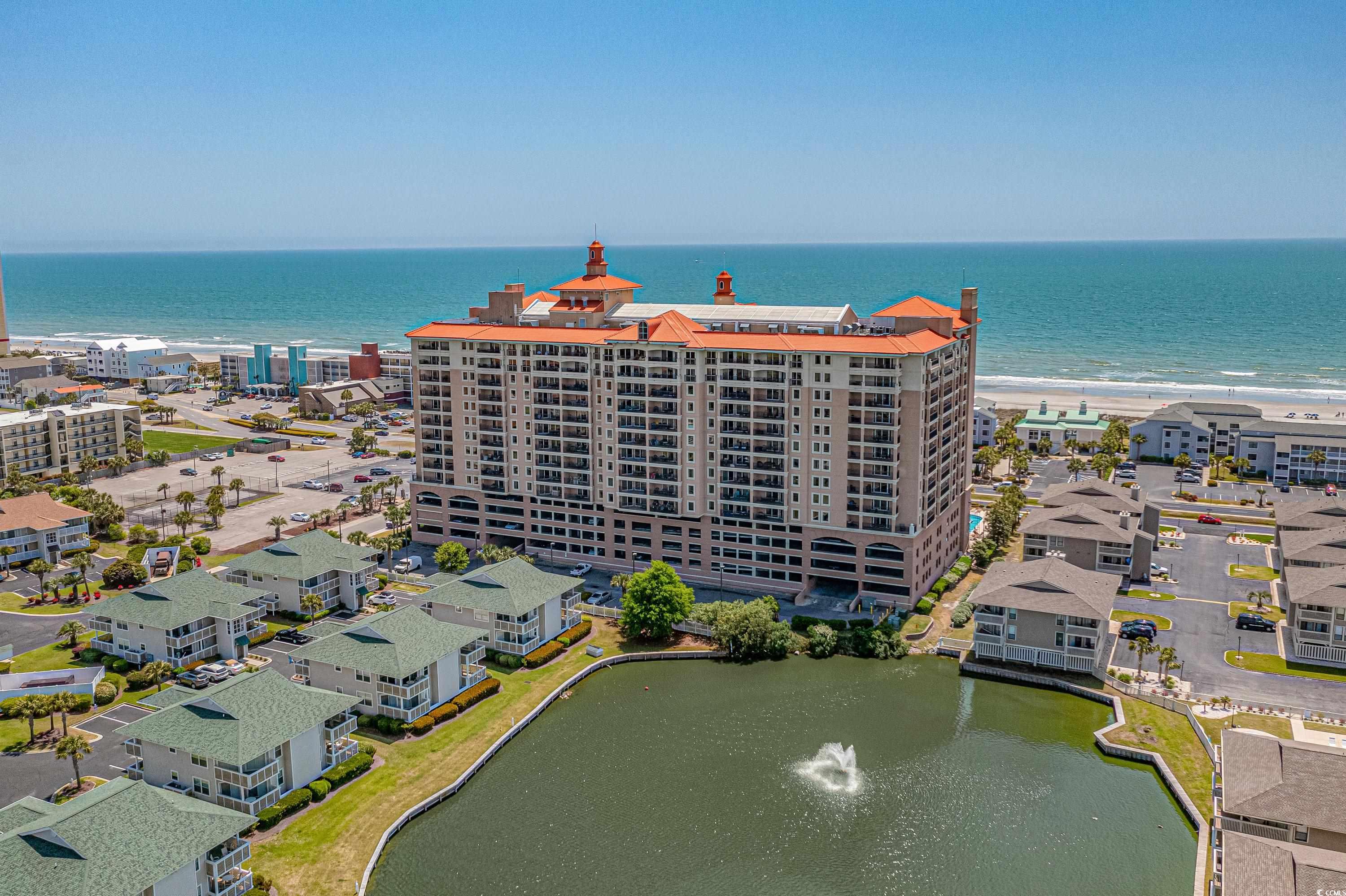 a breath taking views of the surf golf & beach golf course, lake with a fountain and marsh views from this beautiful 12th floor recently updated unit,  located in the one of the most desirable tilghman beach & golf resorts. not one thing was overlooked by the owner and the resort for their owners and their guests to make their stay absolutely enjoyable. the unit was recently painted, new laminate flooring was installed, completely new high capacity carrier hvac installed in 2023, unit also has a reme halo air purifier that reduces bacteria, viruses, odors, and mold spores in the air and on surfaces, all bifold closet doors have been replaced with new versions that look like regular doors, a 6-stage reverse osmosis water filter under the kitchen sink with a mounted faucet provides chemical-free drinking and cooking water, the fridge has a filter on it for ice. the resort is small-dog friendly for owners and there is a grassy pet area outside, there is golf cart charging station for their owners, the  building offers a sauna, indoor heated pool, fitness center, outdoor pool, splash pad, lazy river, and a bar/grill, 5th floor of the property has an atrium, building is directly across from the ocean, the walk way to the ocean includes crossing buttons and strobe lights to stop traffic.the beach access across the street is paved and includes permanent bathrooms.there is a beach bar directly on the beach access across the street. do not wait to make this absolutely worry free, conveniently located to all main attractions condo yours.