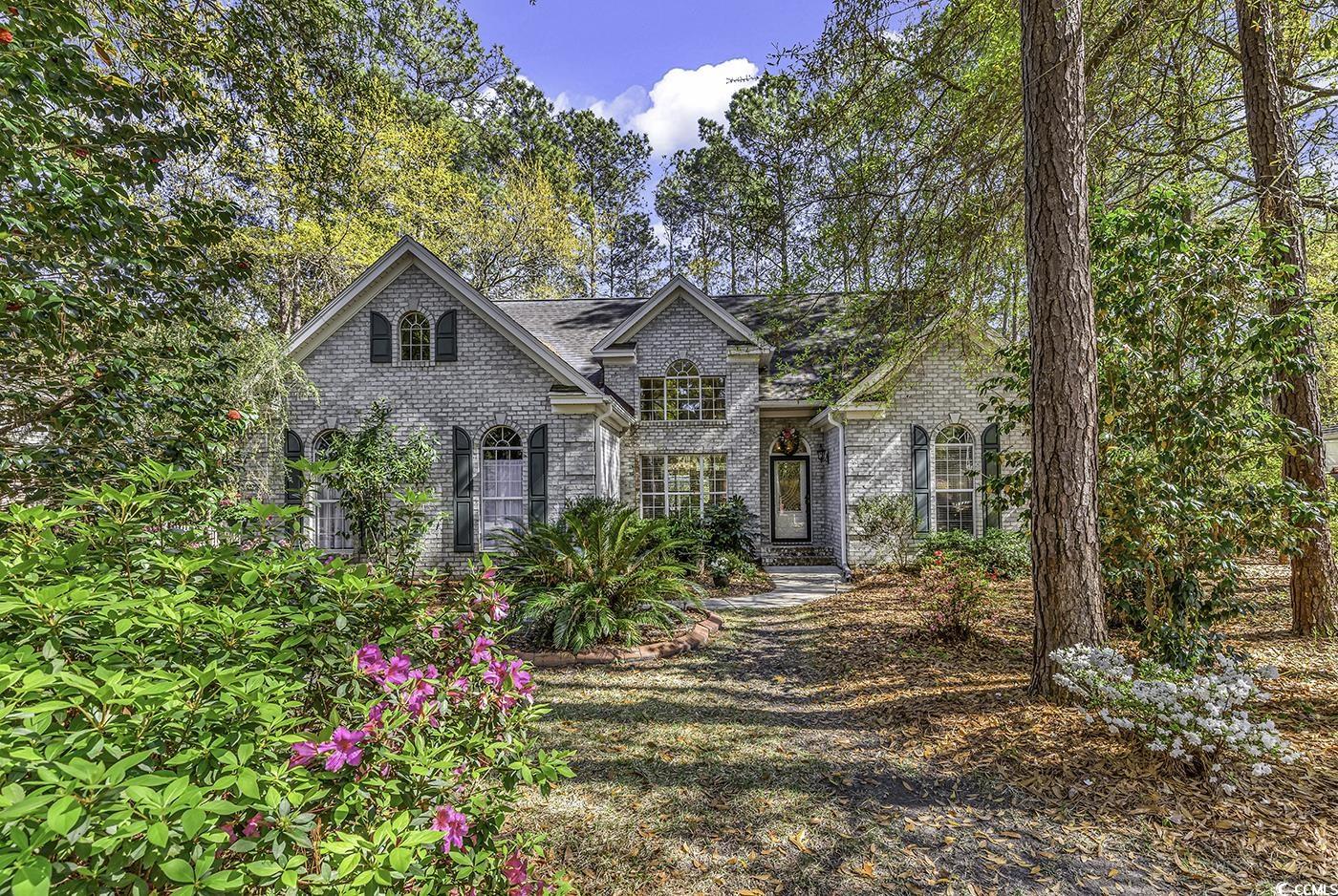 make nature your neighbor! set amongst majestic mature landscaping where colorful azaleas abound! this traditional river club home overlooks large pond from rear deck and offers a plethera of options for the outdoor enthuasist... gardening, room for a pool..or simply bird and wildlife viewing! vaulted ceilings in the family room are anchored by gas fireplace and wall of windows to let in natural light. a split bedroom design offers space for all and a formal dining area offer multiple dining and entertaining options. the river club offers a puclic golf course, community pool and private beach access to all litchfield by the sea has to offer!