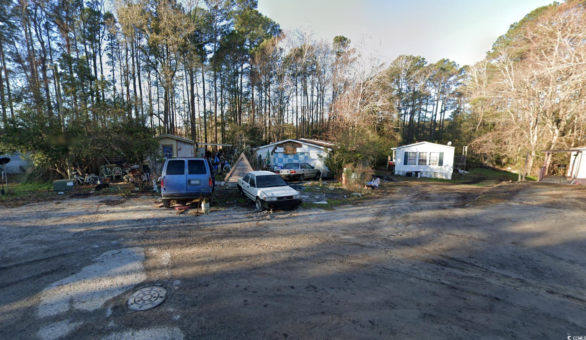 two mobile homes with land located just off of hwy 544 near coastal carolina university