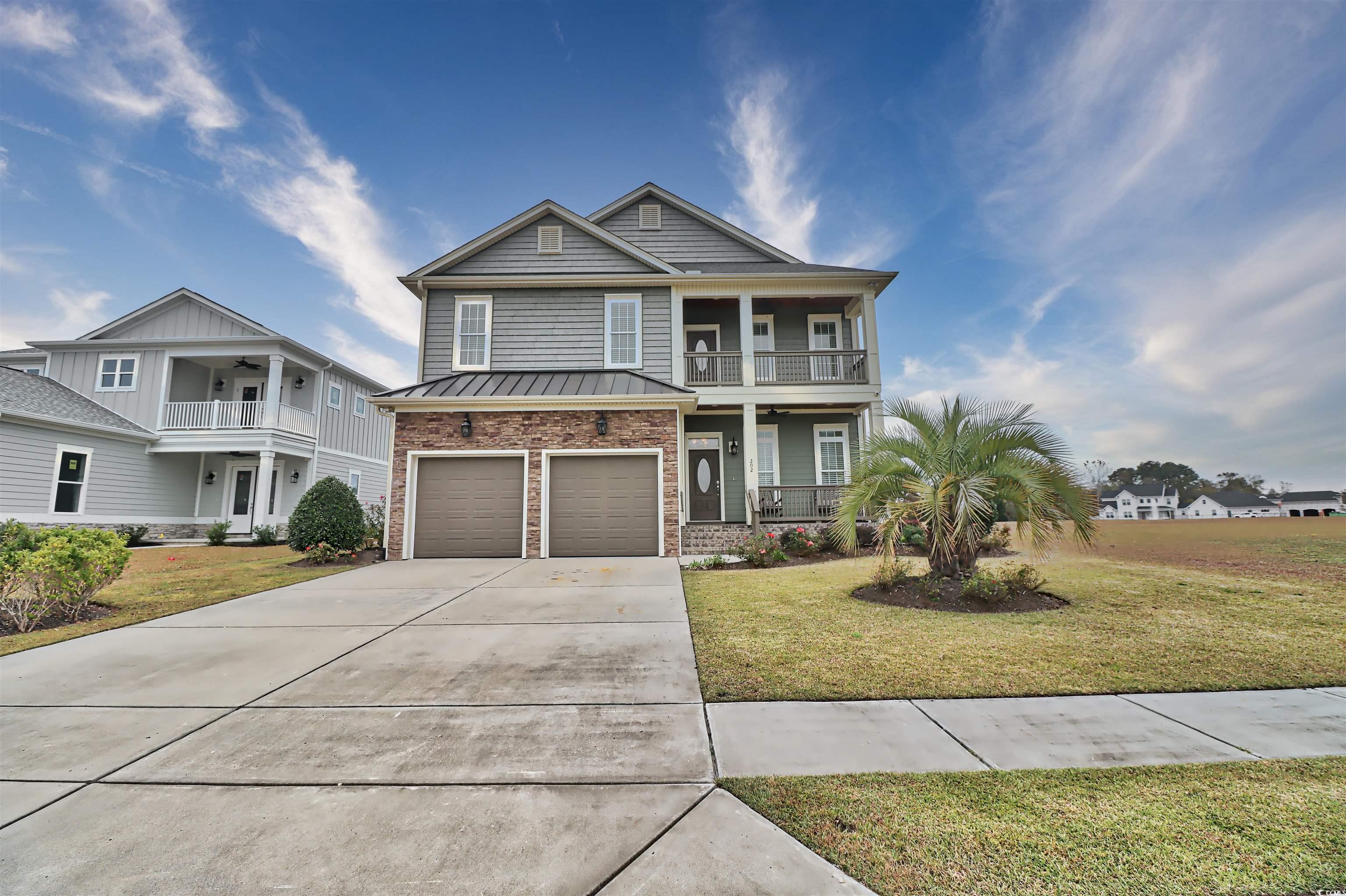 this custom built home is in a very desirable, sought after neighborhood. mainly because it is strategically located close to the ocean, it is bound by the intracoastal waterway on the north and two nicely manicured ponds on the south. the attraction is, it is only a golf cart ride to the ocean, restaurants, and shopping malls in the area. this dwelling is constructed on a raised slab. it has a unique setting on it's lot. you have almost a 360 degree view of the water, intracoastal waterway and the ponds from inside the dwelling. the exterior is hardy plank and shake shingles. the exterior framing on the two levels is 2x6’s with r-19 insulation. the first level is 10ft. ceilings with 8ftsolid wood doors. the floor 18 inch tile in the laundry room and half bath. the balance of the first floor is natural hickory engineer  hard wired security system with cameras first level is an open floor plan. the kitchen, dining room and family room are open. the kitchen cabinets are soft close. the stove is vented to the exterior. take close look at all the molding and wainscoting on the first level. the coffer ceilings in the family room is neatly designed. the closet in the master bed room on first floor is a large walk in closet with built in shelves. the interior walls on each level are insulated to provide quietness and have additional support between each stud for extra strength. the second level has 9f ceilings with extensive ceiling molding. three of the bed rooms on second level have enough space for king size beds and other furniture. three of the bed rooms have large walk in closets with shelves. the 5th bed room is used as an office and mini kitchen or a bedroom. it also has a washer and dryer hook up. the family room 2nd level is very cozy and has access to front porch for a view of the intracoastal waterway.  remember opportunities don't go away they just go to somebody else! do not forgrt to ask your realtor for a copy of the feature list.