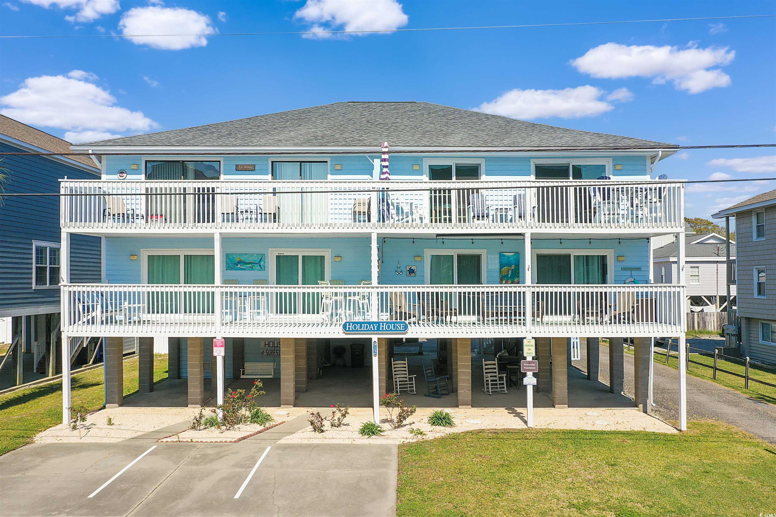 immerse yourself in coastal living with this stunning 3-bedroom, 2-bathroom condo situated in the holiday house complex, just steps away from the pristine white sandy beach. this second-row residence offers a tastefully updated interior, stylish furnishings, smooth flat ceilings with fans, and a generously sized living room that showcases sliding glass doors that opens up to a charming balcony with ocean peek views. the cheerful kitchen is a delight, equipped with a breakfast bar, a range, dishwasher, refrigerator, and ample counter and cabinet spaces. the master bedroom suite boasts his & hers closets, private access to the master bath, featuring a vanity with a single sink, a comfort station, and a timeless tub/shower combo. this condo is completed with two additional bedrooms, a full guest bath, a laundry closet, and extra closet storage. this condo not only provides easy access to the beach and golfing but also immerses you in the vibrant lifestyle of surfside beach. enjoy proximity to fun eateries, award-winning off-broadway shows, public fishing piers, and captivating shopping adventures along the grand strand. additionally, the location is convenient for everyday needs, including grocery stores, banks, post offices, medical centers, doctors' offices, and pharmacies. experience this coastal paradise with our state-of-the-art 3-d virtual tour. put yourself in the heart of beachside luxury and make this condo your ideal home or vacation retreat.