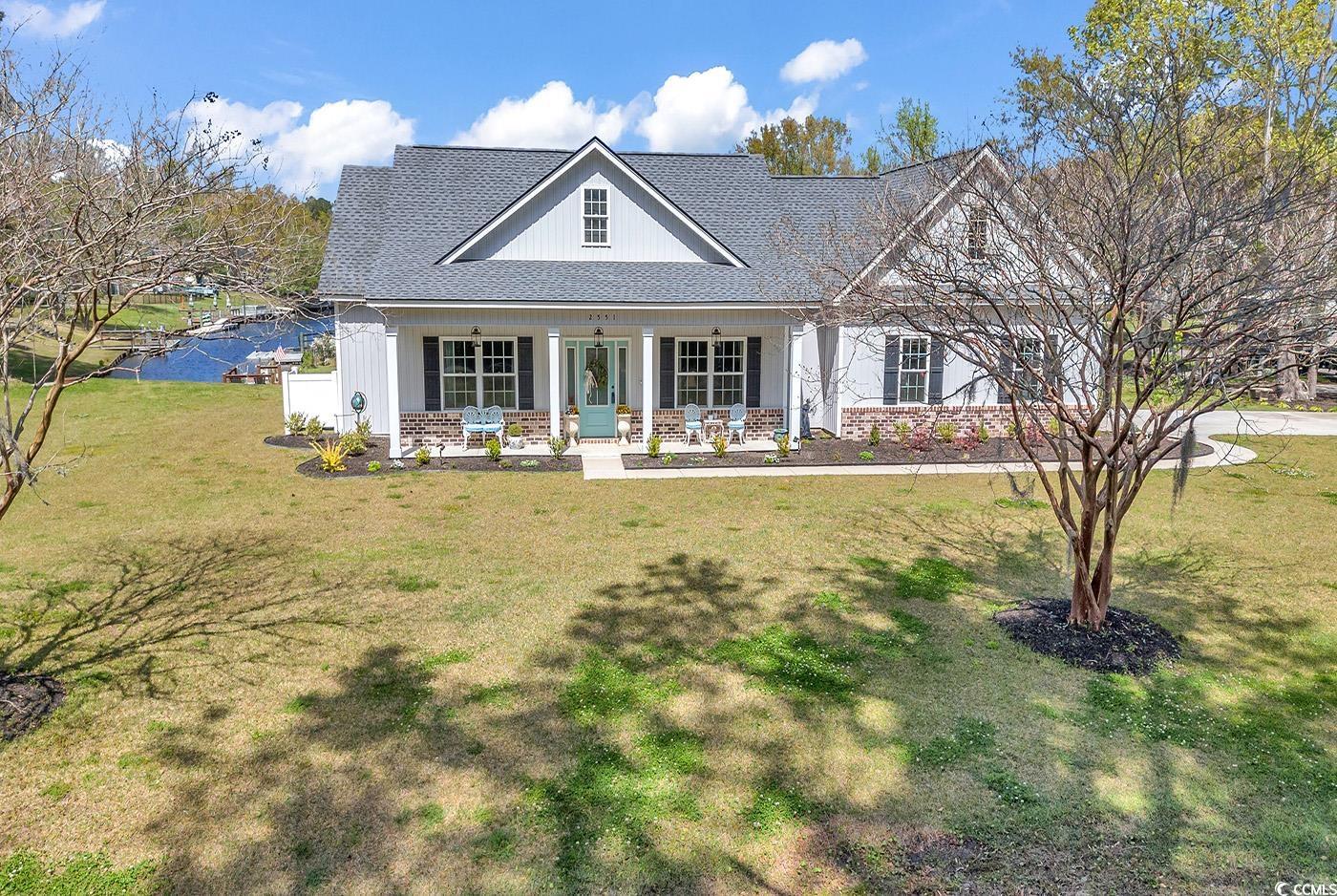 ** brokers open house **  may 10th, 11am-1pm  step into a world of luxury and sophistication with this exquisite 3 bedroom, 2 bathroom home on the dockable canal located in wedgefield plantation in the charming town of georgetown. as you enter through the beautiful entryway, you are greeted by custom details and high-end finishes at every turn.  the custom laundry room is a true gem, making laundry day a breeze with its thoughtful design and functionality. the master bathroom is a sanctuary of relaxation with its beautiful tile work and elegant fixtures, creating a spa-like atmosphere in the comfort of your own home.  in the kitchen, you will find a stunning copper sink and top-of-the-line finishes that will inspire your inner chef. the back porch offers a peaceful retreat with views of the serene dockable canal, perfect for enjoying your morning coffee or hosting a summer barbecue.  outside, the meticulously groomed yard showcases the pride of ownership and attention to detail that defines this property. with a propane gas stove and electric hookups, you have the best of both worlds for cooking options, and propane is available on site for a future fireplace hookup, adding to the cozy ambiance of the home.  inside, high-end ltv floors flow seamlessly throughout the living spaces, while the bedrooms are adorned with plush carpeting for added comfort. this property also boasts access to a golf course, where golf carts are allowed and an onsite pub to wind down after a long day.  located close to downtown georgetown, you are just a stone's throw away from charming shops, delectable restaurants, picturesque parks, and vibrant nightlife, ensuring that you are always at the heart of the action. don't miss your chance to experience the epitome of luxury living in this spectacular property.