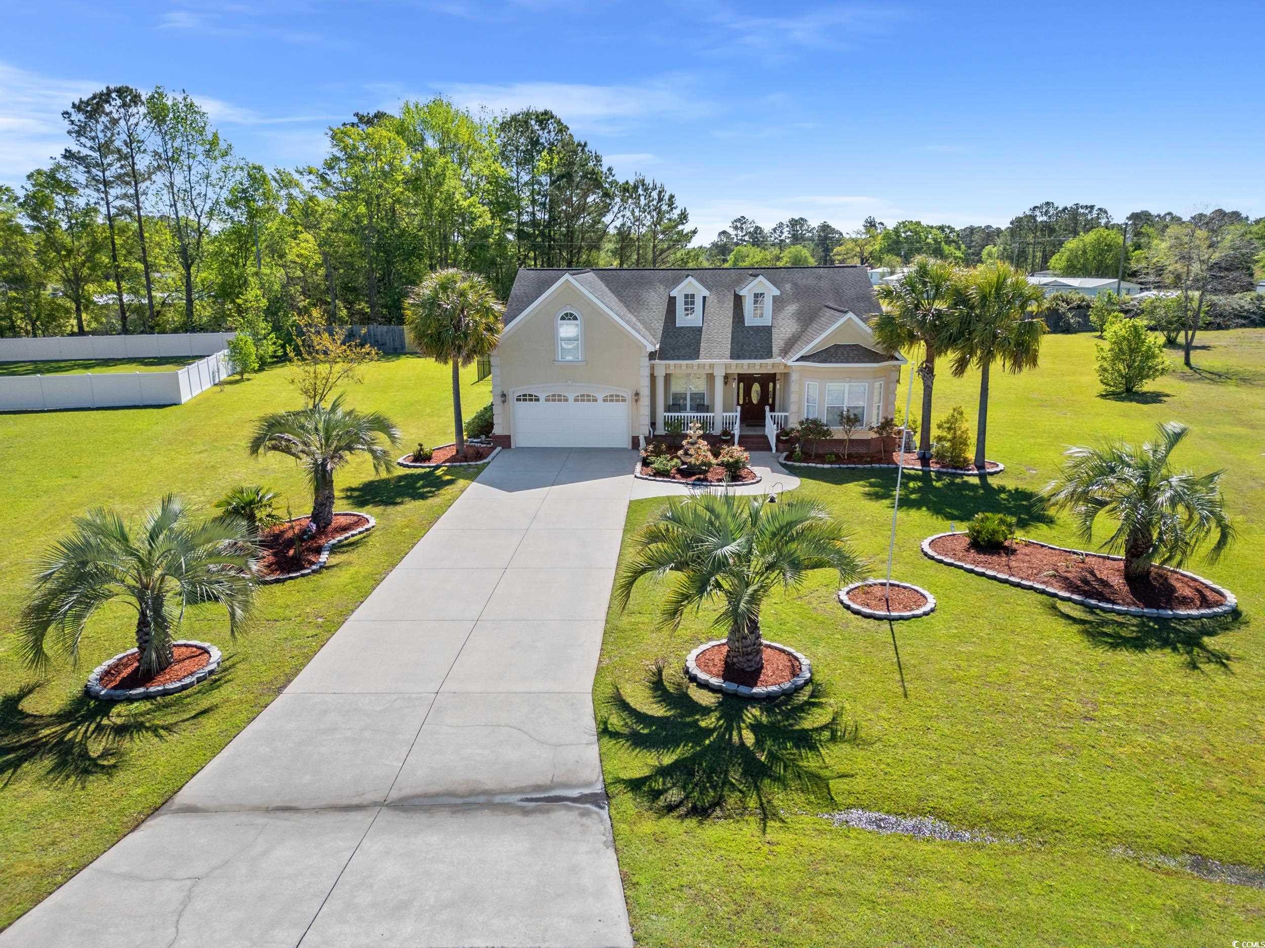 this beautiful custom home is waiting for you, just minutes from downtown conway!  located in the faith hills community, this amazing home has all the curb appeal you could ever want! as you approach this home, you are welcomed with an extra-long driveway that leads you to a relaxing and inviting front porch! when you open the front door, you will immediately see the stunning marble tile floors and the open concept. hardwood flooring exists throughout the dining and family room. the owner remodeled the kitchen with state-of-the-art appliances, which makes cooking a joy. there are four first floor bedrooms, including a mother-in-law suite to give everyone plenty of space. a bonus room is located upstairs that could serve as a fifth bedroom or many different purposes. custom light fixtures can be found in the great room and master bedroom. the master bath is a little piece of heaven with custom tile and a jacuzzi tub for your relaxation. don’t forget the carolina room that overlooks the fenced in backyard complete with patio, which is perfect for entertaining, playing and family dogs. this is country living at its best with easy access to highway 501, conway and the beach. schedule your showing today to see this rare beauty in person!
