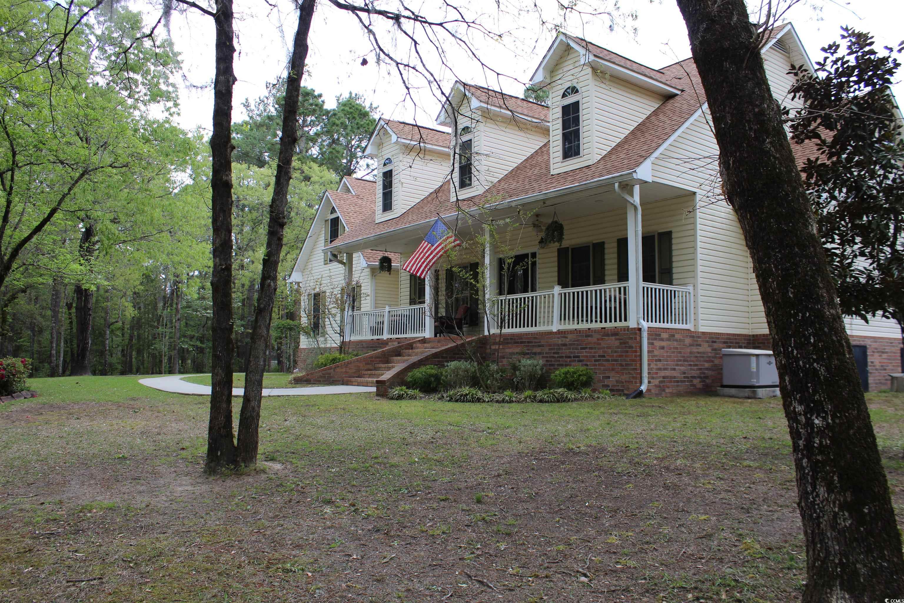 welcome to 2335 lendrim lake drive in conway!  stunning low country style residence located in mill creek estates, featuring 3 bedrooms plus an office, 2.5 bathrooms, all situated on a unique 5-acre parcel. ideally positioned near international dr., this home boasts a gourmet kitchen, a lavish primary suite, a vaulted foyer, an in-ground pool, hardwood and tile floors, a finished bonus room, and eco-friendly amenities including solar panels and geothermal heating/cooling. well-built with safety measures in place, additional highlights include a central vacuum system, wired surround sound, and beautiful landscaping. nestled in a highly desirable neighborhood. mill creek is an esteemed community featuring custom homes designed in a low country style, offering lot sizes exceeding 5 acres. this community is ideal for those seeking proximity to myrtle beach, the ocean, and a variety of entertainment and dining choices.  if you desire a conway residence with ample space and stunning scenery, mill creek is the perfect neighborhood for you. these estate homes are set on spacious lots within a short 10-minute drive to myrtle beach, providing access to the ocean and a plethora of dining and entertainment options unique to this renowned city. additionally, the location is unbeatable, situated just 2.3 miles from international drive!