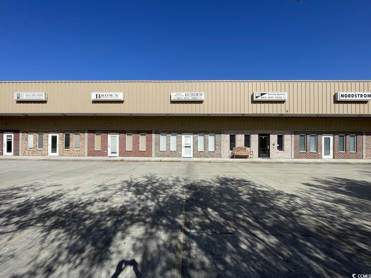 for lease:  fully conditioned 2,000 sf office/warehouse with reception area in front, 2 private offices, work area with sink and restroom.  office area in front is approx. 20'w x 20'l (400 sf).  1,600 sf warehouse area in rear with 12x12 overhead door and additional loft storage above office area accessible via stairwell from warehouse.  small outdoor storage area in rear.  property is located outside of surfside beach city limits, under horry county jurisdiction.  re-4 zoning.