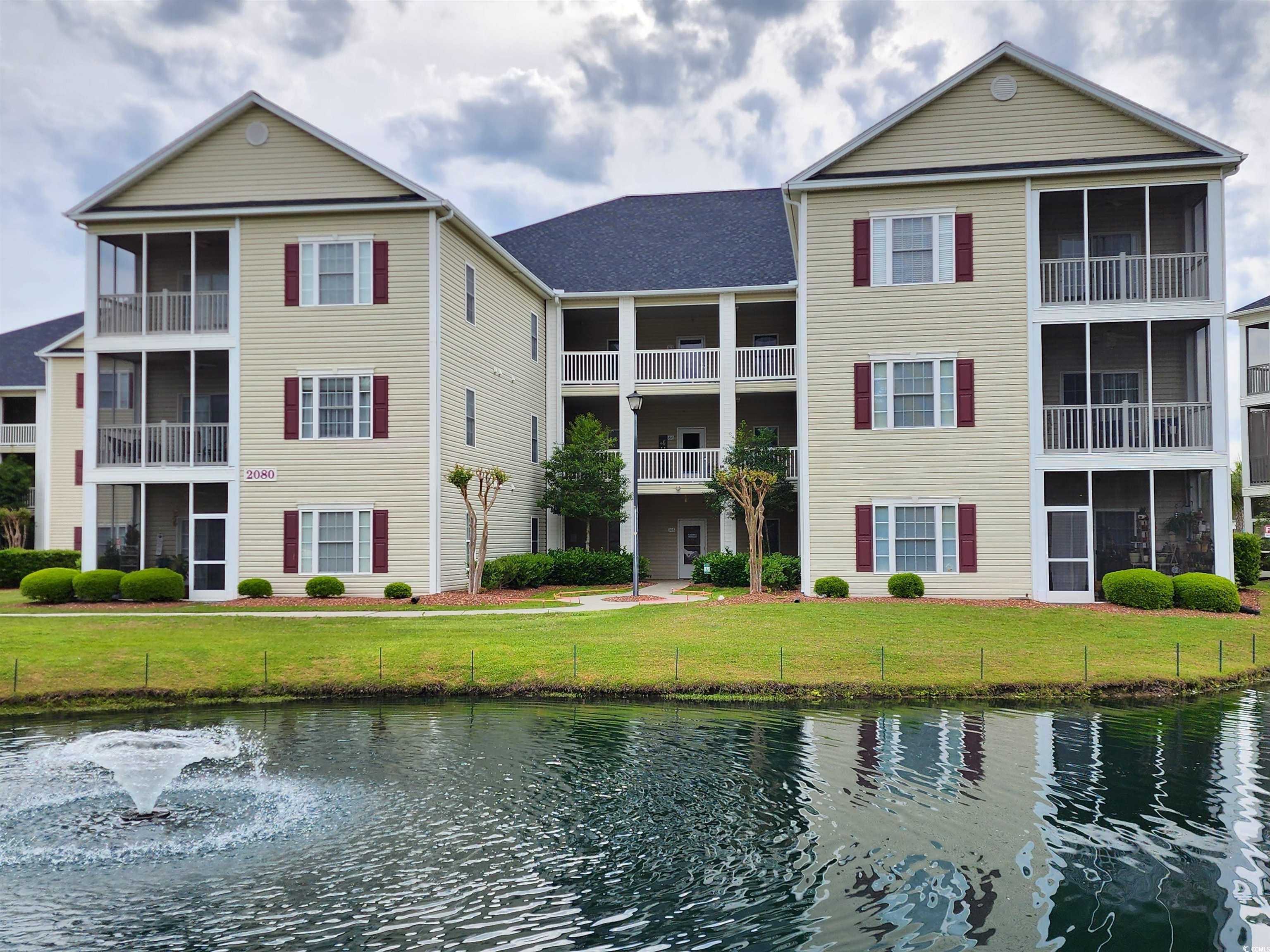 beautiful first floor end unit only 2 miles from beautiful surfside beach pier. you are close to so many shops and resturants for you to enjoy.  this spacious split bedroom condo has all new carpet throughout. kitchen includes refrigerator, stove, microwave and dishwasher. the screened in porch looks at the pond and is a great place to unwind and enjoy the wildlife.  master has walk in closet and shower. community pool and barbeque area available for your relaxation on any summer day.  all measurements are estimated and approximate, buyer is responsible for verification.