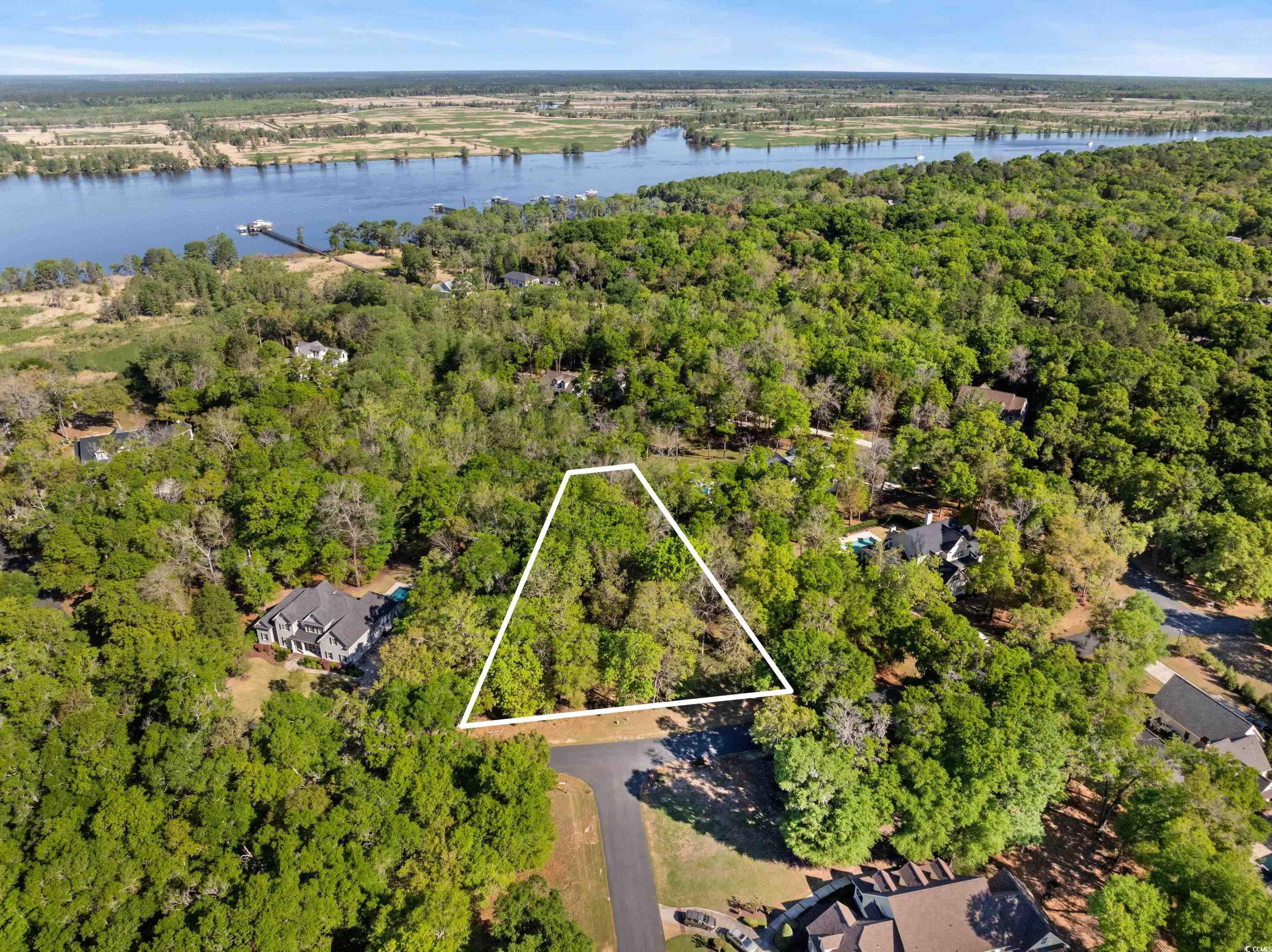 live the coastal lifestyle on this acre-plus wooded lot within the beautiful community of allston river bluffs. property owners enjoy gated access, low hoa and exclusive use of a private riverfront marina. each of the 20 community home-sites has an assigned boat slip with water and electric, providing easy access to the waccamaw river - a segment of the intra-coastal waterway. the charming open-air community lodge near the marina offers a built-in wood-burning fireplace and breathtaking sunset views over the river. convenient to schools, medical facilities, shopping, restaurants and award-winning golf courses as well as to some of the finest beaches along the east coast.