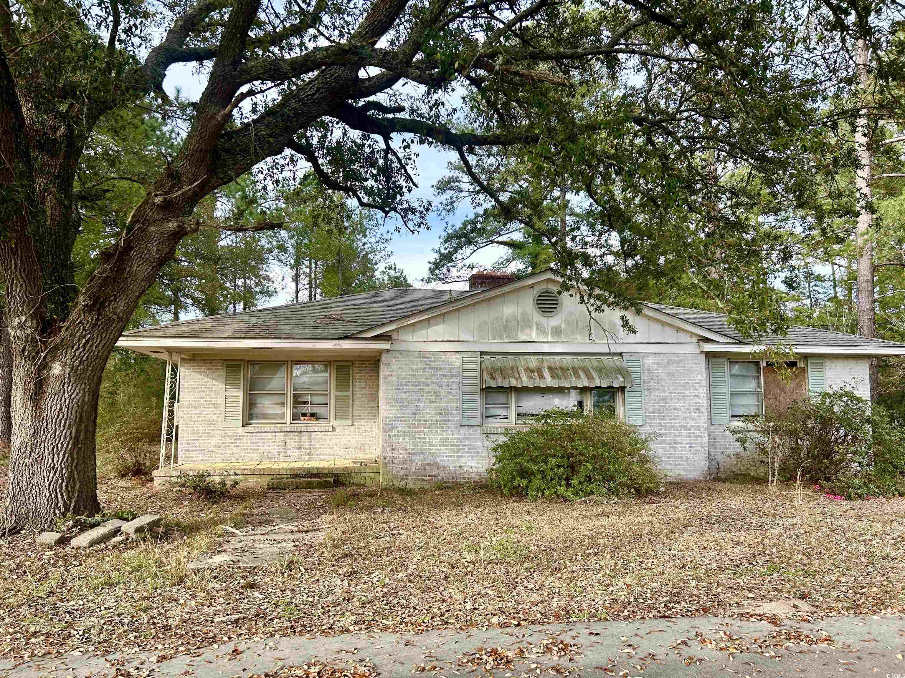 this is a great investment opportunity with almost an acre of land and a little over 1400 heated square feet of space.   listing agent is related to homeowner.  home is being sold as-is.