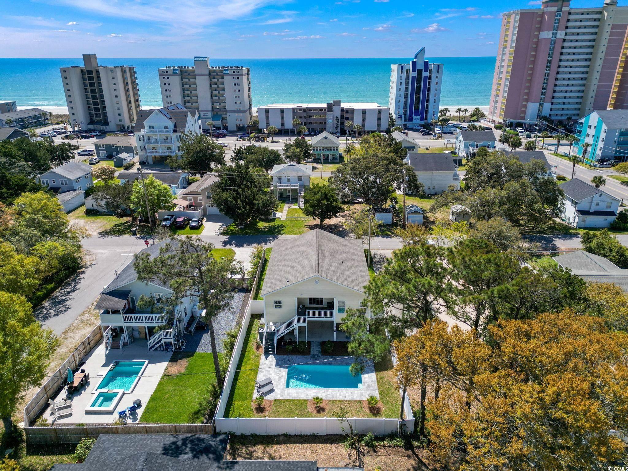 open house sunday, april 21st 12pm-3pm. step in to paradise. welcome to your very own beach home. this 4 bedroom 3 bath beach raised home is the perfect opportunity to own your own piece of paradise. within a mere few minutes, you can have your feet in the sand after walking out the front door. if you get tired of the beach and sand, just come back and prop your feet up next the pool in this backyard paradise. walk up the stairs from the pool patio and you'll find yourself arriving on the back porch before walking through the doors into the kitchen so you won't have any issues grilling out with ease. a laundry room is conveniently located just off the kitchen while the living and dining space is easily accessible in this open floor plan. short term rentals are allowed in this no hoa home and has great potential being only one block from the beach and the home even comes furnished! check out this gorgeous property to own your own little piece of paradise!!