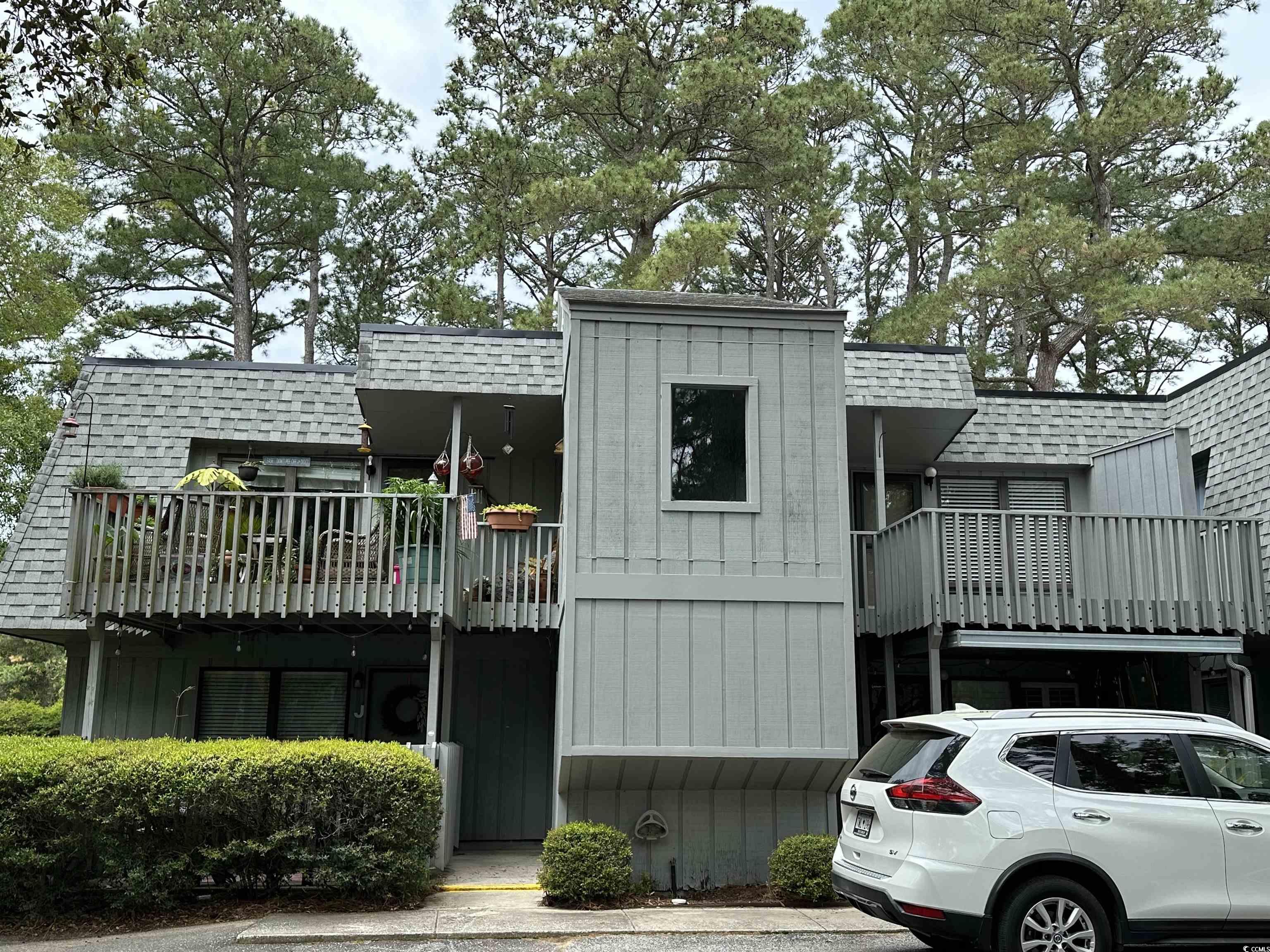 salt marsh cove community is conveniently located just a short bike ride to the coastal areas of litchfield beaches and pawleys island beaches. the community overlooks the marsh with community dock and temporary boat parking. enjoy the community pool, clubhouse and dock on the marsh with plenty of walking areas in park-like setting surrounding pond. relax on your second floor deck and watch the sunrise. affordable location for second home beach get-away or fulltime living.  close to golfing, shopping, hammock shops, art galleries and many specialty restaurants.  one hour drive to historic charleston area and 30 minutes from myrtle beach airport.