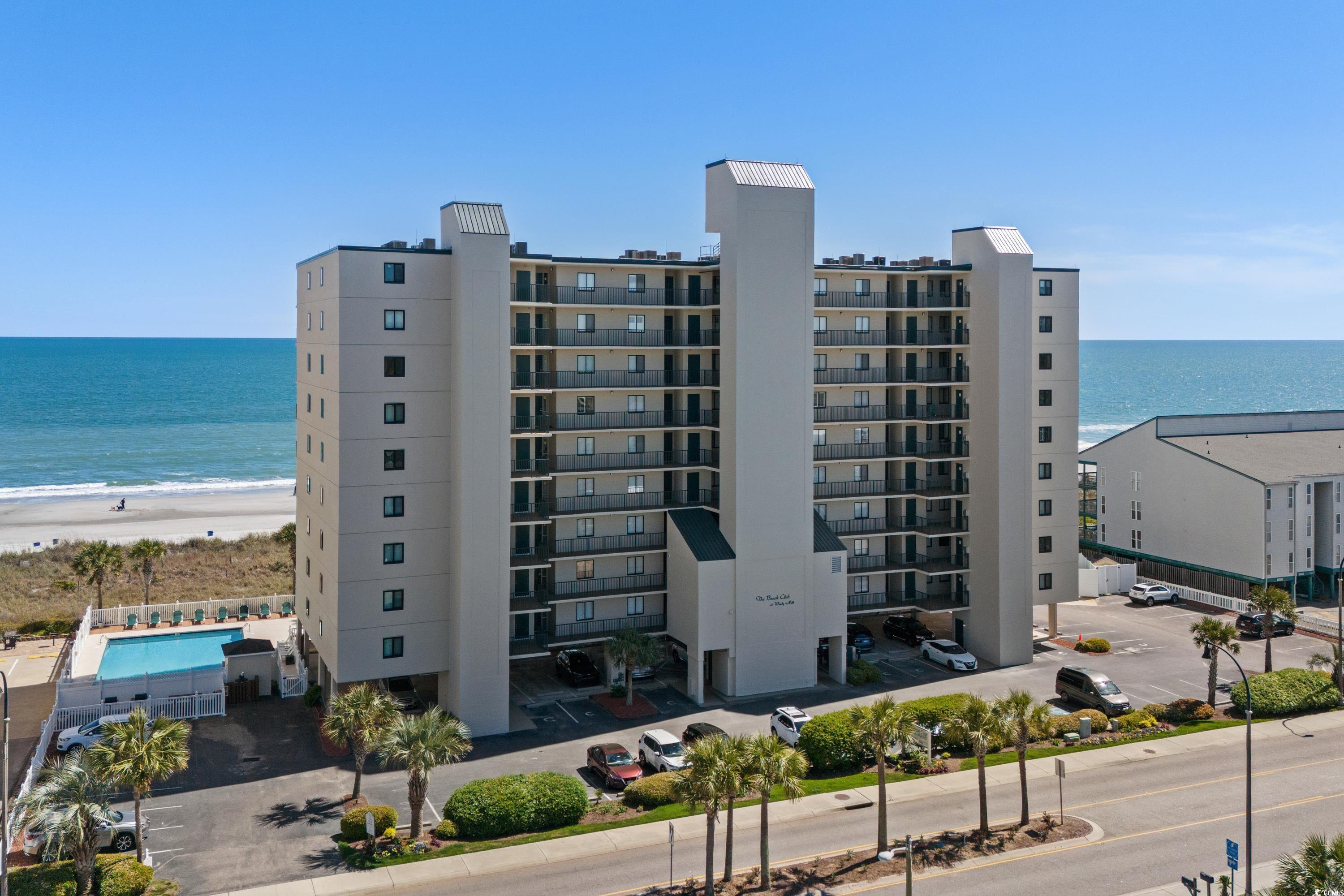 rare opportunity to own this end unit direct oceanfront 4br/3ba penthouse condo on the 9th floor at the beach club of windy hill.  endless unobstructed views of the northern and southern coastline from this property are truly magical and span as far as the eye can see. on any given day, enjoy views of the myrtle beach sky wheel or the serene sandy shores of cherry grove beach from your private 30' balcony. the grand balcony has an overhang that offers options for shade or sunlight at your pleasure. this seaside splendor presents just under 1700 sq feet of ultimate comfort for coastal living with generous room sizes, full size washer/dryer, large kitchen with bar, and open concept design. there are many windows that frame the breathtaking ocean views. step into a generous foyer, providing ample space for showcasing artwork and features a spacious interior storage room for all of your beach gear and supplies.  a luxurious direct oceanfront primary suite with walk-in closet has a private bath with separate shower, jacuzzi tub with double vanity.  the secondary bedroom is an ensuite with it's own private full bath. the other 2 bedrooms share a true jack-and-jill bathroom. a kitchen with room for multiple cooks has bar seating, lots of cabinetry and pantry.  the dining and living area is spacious and provides versatile options for furniture arrangements. some furnishings will convey and these original owners have never rented this property. the beach club of windy hill sits proudly on 5 oceanfront lots which allows homeowners to relish a more expansive beachfront footprint to enjoy the sun and the sand. there is also a deeded overflow parking lot across the street for family and friends.  owners are welcomed to have pets.  the large in-ground pool is conveniently heated in most off season months and there is a grilling area with picnic tables and community herb garden. if you crave luxurious oceanfront living, spectacular sunrises, incredible restaurants and entertainment nearby, then this property is your own personal oceanfront retreat tailor-made for you. list agent is distantly related to the seller.