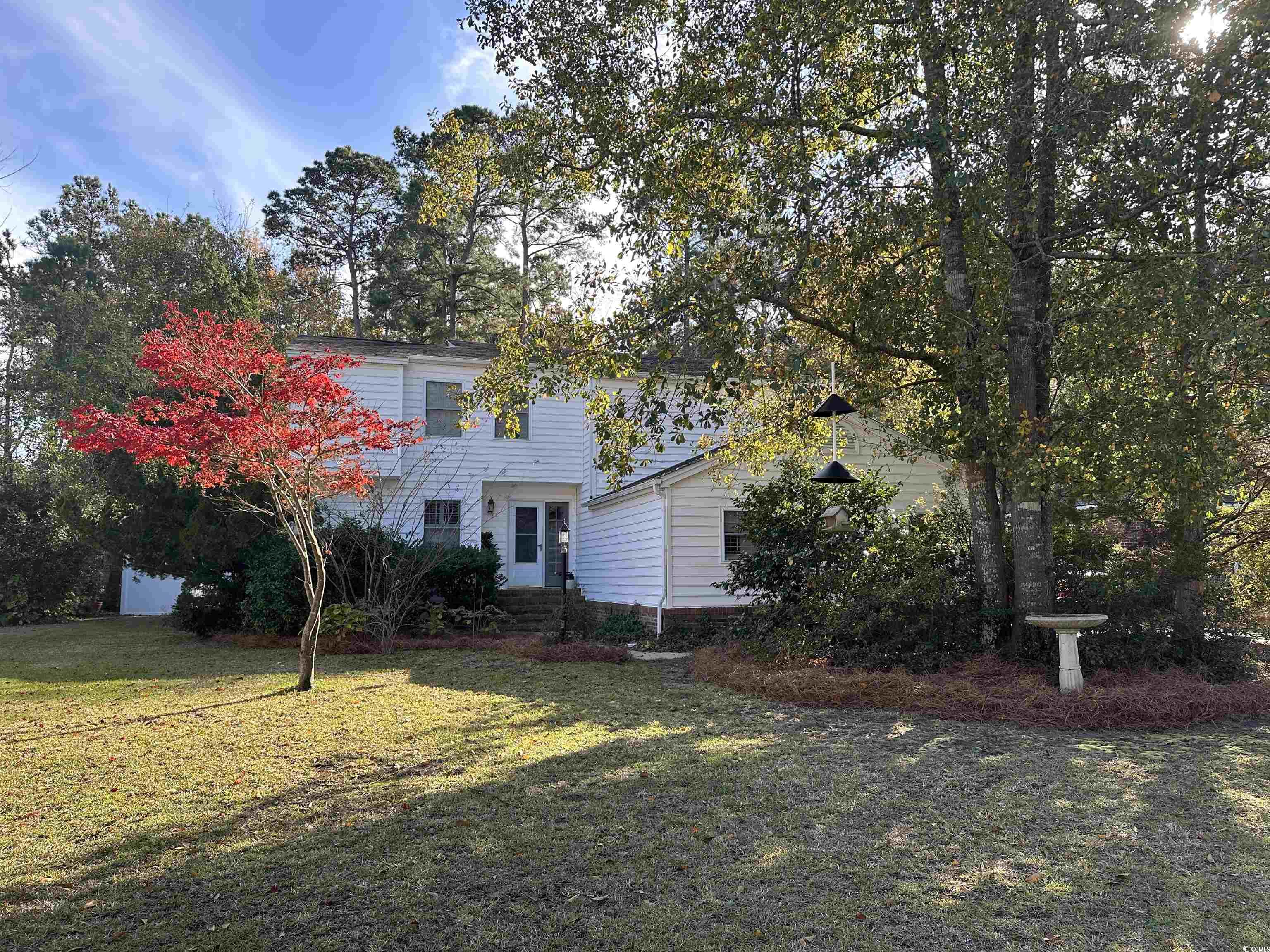 4 br home in ricefields with a big, private fenced yard! it's contemporary, yet traditional, with 2467 hsf of flexible living spaces. the kitchen is open to the breakfast room and den with fireplace. the formal dining room is open to the large living room. plus there's a carolina room that can be closed off with access to the back deck and huge fenced back yard...big enough to add a pool! this home offers plenty of room for everyone to spread out! there is one bedroom on the main floor with it's own bath. upstairs, one en suite, while the other two bedrooms share a bath. the laundry room and powder room are located between the kitchen and the 2-car garage. very convenient to all pawleys island schools, shopping, dining, and medical facilities, ricefields offers its residents a full array of great amenities including a community pool, boat landing access to the waccamaw river/icw, a beautiful nature trail, streetlights, and sidewalks. ricefields...it's a great place to live!