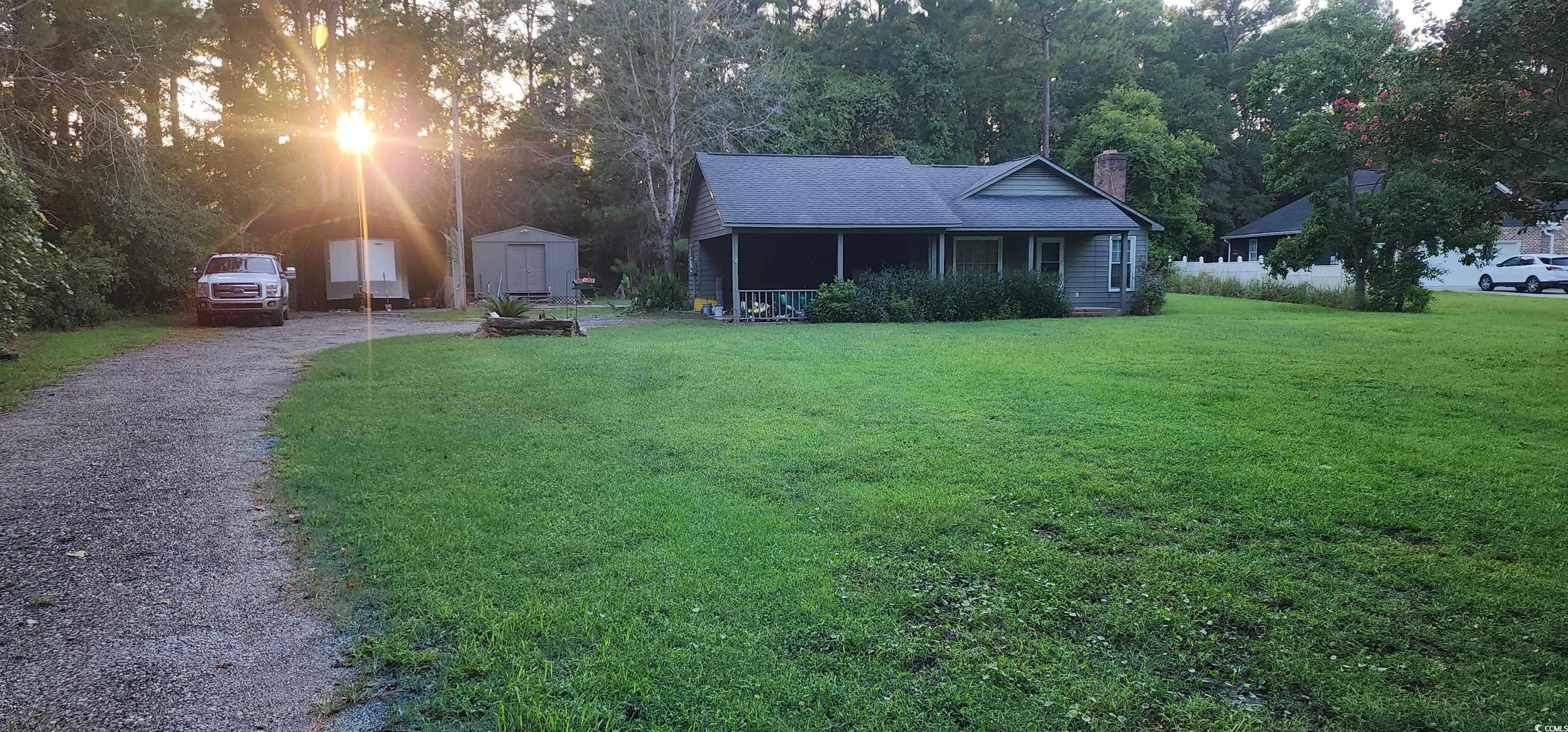 nestled in tranquility, this impeccably maintained 3-bedroom residence in the scenic belle isle community of georgetown offers the perfect blend of comfort and convenience.  with its prime location near boat landings, outdoor enthusiasts will delight in the easy access to waterfront activities on the winyah bay.  this home provides the freedom you desire, with the opportunity to park boats or rvs on your property. additionally, a large workshop and a detached boat shed offer amply storage space for all your needs.  the back patio area is a delightful spot for hosting gatherings or simply taking in the scenery.  the location adds to its appeal, it's minutes away from historic georgetown area.  enjoy a stress-free commute to charleston or myrtle beach, knowing you'll return to your peaceful haven at day's end.  don't miss out on the chance to make this your forever home -- schedule your showing today!