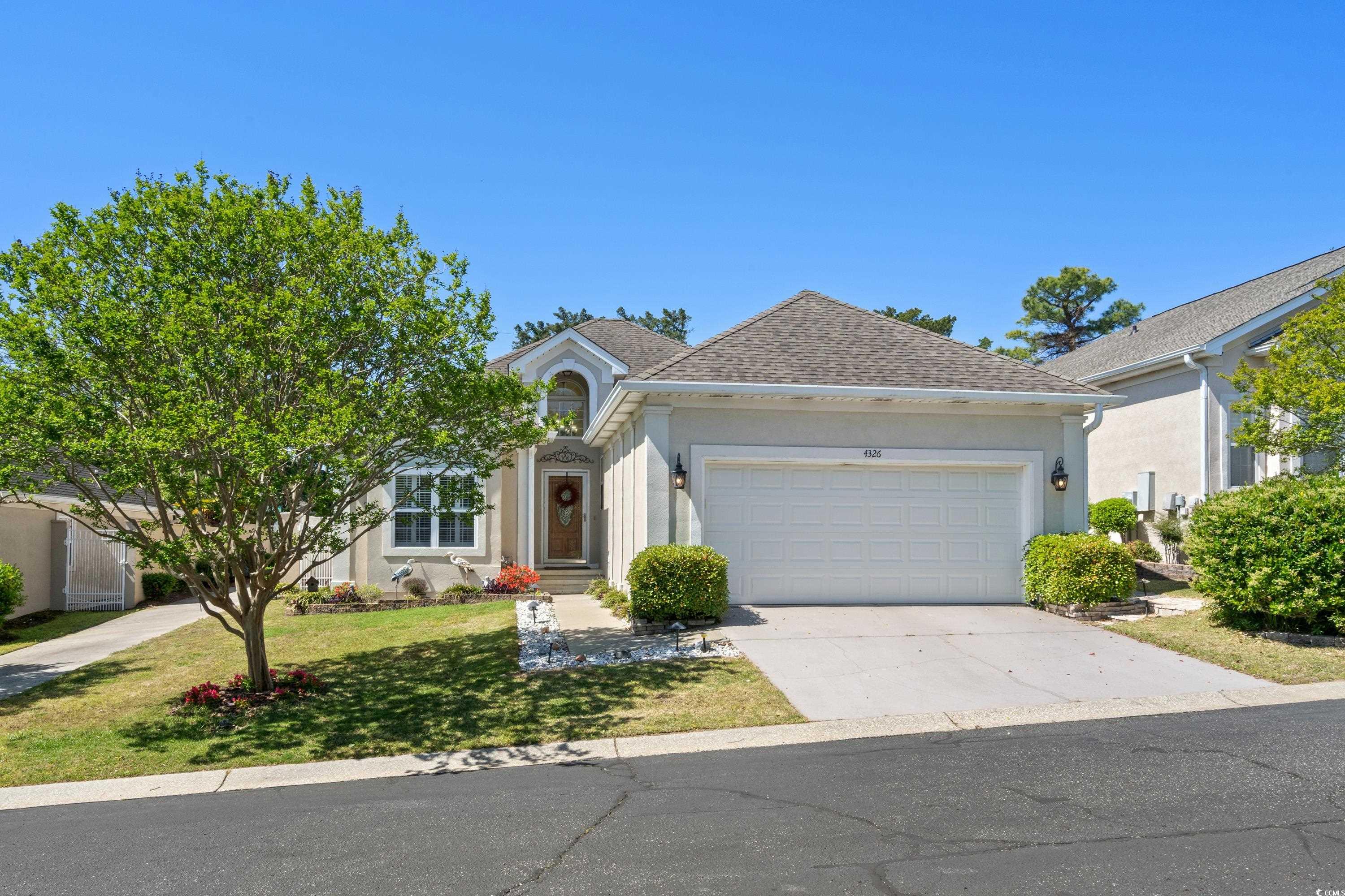 well-maintained charming courtyard home located east of hwy 17 and just steps to the beach in the windy hill section of north myrtle beach. this 2 bedroom, 2 bath home has nearly 1500 heated sqft with an attached 2 car garage and a beautiful backyard with privacy wall fencing. the heights at windy hill is a 36-home, gated community that allows golf carts, motorcycles and pets for owners. no short term rentals under 30 days. beautiful engineered hardwood floors, crown molding, plantation shutters, led light fixtures, along with an open floor plan, make this home a must see. you will love the large 16’ x 17’9” owners’ suite with a 9’x9’ walk-in closet, giving you lots of storage. recent upgrades include granite vanity tops in both bathrooms and lvp flooring in kitchen and guest bathroom. in addition, the eat-in kitchen features new quartz countertops with backsplash, plenty of cabinets (white top cabinets and blue on bottom), stainless steel appliances, ample counter space, shiplap ceiling with designer lighting, and a laundry closet with side-by-side washer & dryer. all appliances convey. architectural shingle roof installed 2012. water heater installed 2014. the back patio offers complete privacy with a tall, solid privacy fence and side gate. the backyard has low-maintenance landscaping, landscape lighting, an outdoor shower, along with concrete patio and pavers which provide plenty of seating areas to enjoy the outdoors.  the garage has been finished with painted walls and floor. pull-down stairs lead to a floored attic for additional storage. enjoy the beautiful park-like area with a gazebo in center of the community. golf carts, bikes and pedestrians can use the community back gate to access 45th ave s that leads directly to beach-front golf cart parking. you can even see the ocean from the back gate. home is in the lowest risk flood zone “x” that typically does not require flood insurance. low hoa fees cover gate maintenance, road maintenance, and common areas. this home has never been rented. don’t miss all the shopping, restaurants, dance clubs and entertainment all around! come see this beautiful beach home on the grand strand just a few blocks from the sandy shores of the atlantic!