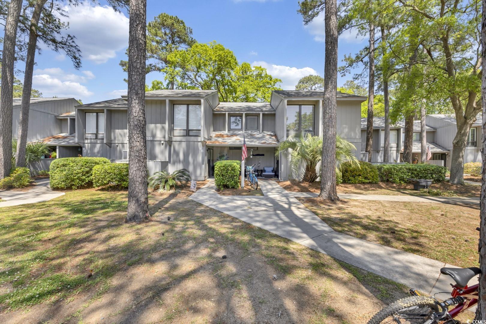 this newly listed home in a charming waterfront community east of 17 offers a delightful lifestyle. within walking distance to south litchfield beaches, dining, shopping, and recreational facilities including pickleball courts and a ymca, convenience is paramount. surrounded by ancient oak trees, the home boasts stunning views through new energy-efficient pella sliders and windows. tucked into a corner, the end unit townhome provides privacy while being close to the community pool and playground. fresh paint throughout creates a warm ambiance, complementing the renovated kitchen with granite countertops, stainless-steel appliances, and shaker style slow-close cabinets. a renovated bathroom on the main level adds convenience and style, while new carpeting upstairs enhances comfort. three spacious bedrooms and two baths upstairs offer ample space. new essentials like a hot water heater, hvac system, wyze security, and wi-fi smart thermostat, peace of mind is ensured. the community features a large swimming pool, community dock, boat storage, and clubhouse, with the hoa fee covering various services including cable/wifi, water, sewer, trash pick-up, pest control, lawn care, and exterior maintenance. move-in ready and attractively priced, this home promises a worry-free lifestyle in a beautiful location!
