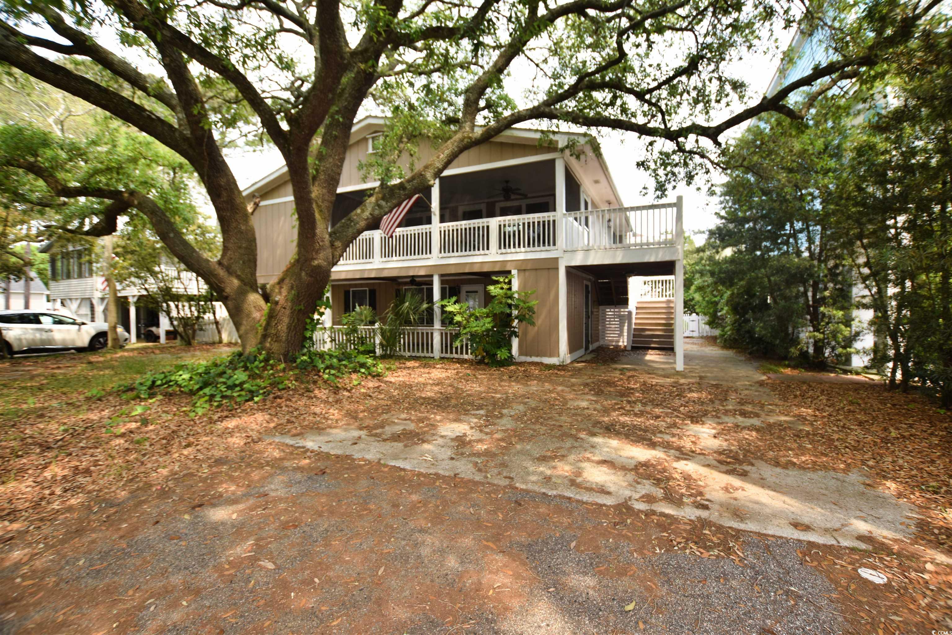 open house on saturday ( may 4 ) from 11am to 2pm ******************************************************************discover coastal elegance at surfside beach ! situated in the heart of the desirable short-term rental district of surfside beach, this stunning property is mere steps from the ocean's edge—offering an unparalleled beach lifestyle. this expansive home not only boasts an excellent location but also features a charming guest house, known affectionately as "the doll house." with its own separate entrance and private bath, it provides perfect privacy for guests or potential rental income.  the main residence is a sanctuary of space and light, featuring three well-appointed bedrooms and two and a half luxurious bathrooms. the master suite on the ground floor includes an additional three bedrooms and two bathrooms, ensuring ample space for family and guests alike. experience the warmth of the family room, complete with a cozy fireplace, ideal for cool evenings by the sea.  architectural excellence is showcased throughout with vaulted wood ceilings that enhance the sense of space and openness. the private sauna adds a touch of luxury, offering a serene retreat after a day at the beach. outside, the massive deck invites you to relax and entertain with spectacular ocean vistas.  additional features include a storage building with potential to convert into extra living space, adding versatility and value to this exquisite property.   this home is a unique blend of comfort, charm, and location, making it a perfect escape or an investment opportunity with its weekly rental potential. don’t miss out on the chance to own a piece of paradise at surfside beach. ( lot size is 64' x 109 ' )