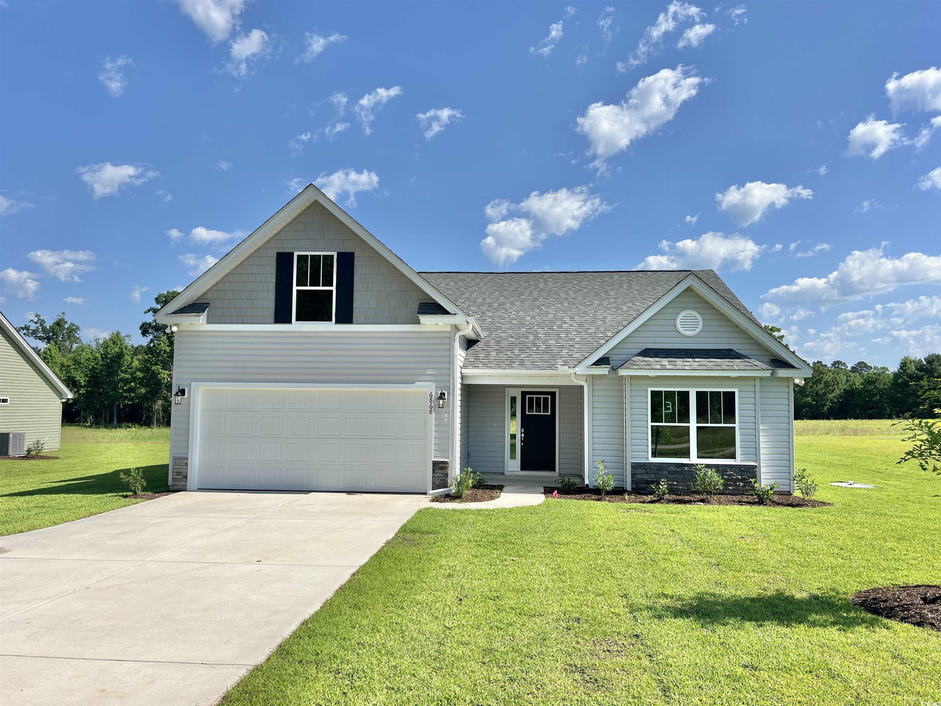 new construction, 4br/3bath home on 1/2 acre lot!! have you been looking for a new, no hoa home on a large lot close to the beach, but away from the hustle and bustle??? if so, this beauty is the one!!! bring your rv, boat, utility trailer, and install your pool and detached building. this yard can accommodate it all!!! this well-appointed home features huge upgraded wood-look laminate flooring in the great room, dining area, and entry/hallway, granite countertops in the kitchen, tile flooring in the bathrooms, laundry and kitchen, double vanity and custom tile walk-in shower in the master bath, vaulted ceilings & ceiling fans in living room and all the bedrooms, and an irrigation system to keep your yard green during the summer months. this home has a very peaceful setting in conway yet offers a short drive to all the grand strand has to offer. as the new owner of this gorgeous home you'll never be far away from golfing, fishing, dining, shopping... sand, sun and fun!!! **pics 7-17 are of another similar completed home**