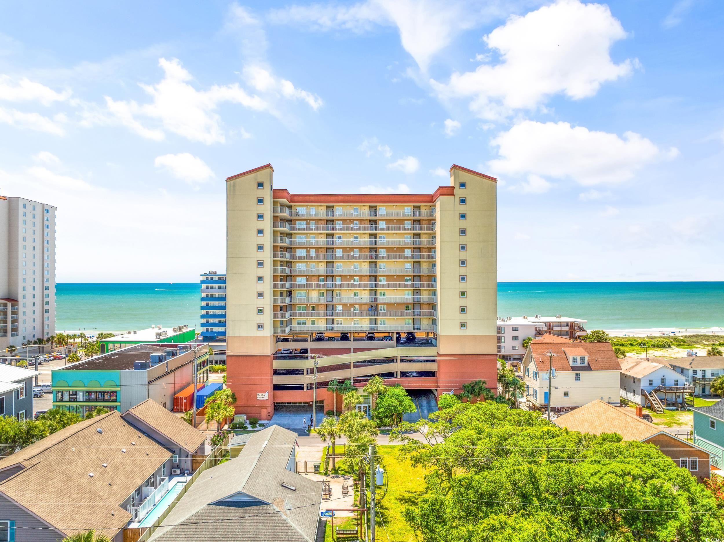 welcome to your fully furnished dream ocean view escape at malibu pointe in north myrtle beach! this stunning 4-bedroom, 4-bathroom condo boasts breathtaking ocean views and fantastic features throughout its 1654 heated square feet (1808 total square feet). as you step inside, you'll be greeted by tall maple wood kitchen cabinets complemented by black with gold flake granite countertops, stainless steel appliances, and a high-top breakfast bar with comfortable bar chairs. the kitchen is perfect for preparing meals while enjoying ocean views. the spacious master bedroom offers private access to the ocean-view balcony, a generous 6x4’6” walk-in closet, and a private bathroom with dual sinks, a relaxing whirlpool tub, and a stand-up fiberglass shower with a sleek glass door. each of the remaining bedrooms also features private bathrooms, ensuring convenience and privacy for all. throughout the condo, ceramic tile flooring provides durability and easy maintenance. being an end unit, you'll benefit from extra natural light streaming through the windows, enhancing the bright and airy ambiance. step outside onto the expansive 26’x10’ ocean-view balcony, enclosed with azure blue tempered glass, and soak in the stunning vistas of the atlantic beach and ocean. additional features include a new hvac system installed in 2019, ensuring comfort year-round. residents of malibu pointe enjoy access to fantastic amenities including indoor and outdoor pools, a lazy river for relaxing afternoons, a well-equipped workout room for fitness enthusiasts, and multiple floors of parking underneath the building. this fully furnished condo could easily be used as a primary residence, vacation home, or rental property, offering versatility and investment potential. malibu pointe is located on ocean blvd. across the street from the beach, centrally located in north myrtle beach.  you can walk to the well-known oceanfront molly darcy’s irish pub across the street, the 17 mini mart and the surf & sun beach store. centrally located in north myrtle beach, you're a quick drive to main street, the od, shagging, and all the areas entertainment, attractions, shopping, and restaurants.  don't miss this opportunity to own a slice of paradise in one of north myrtle beach's most coveted locations. whether you're seeking a luxurious vacation home or a lucrative rental investment, this condo ticks all the boxes for coastal living at its finest!