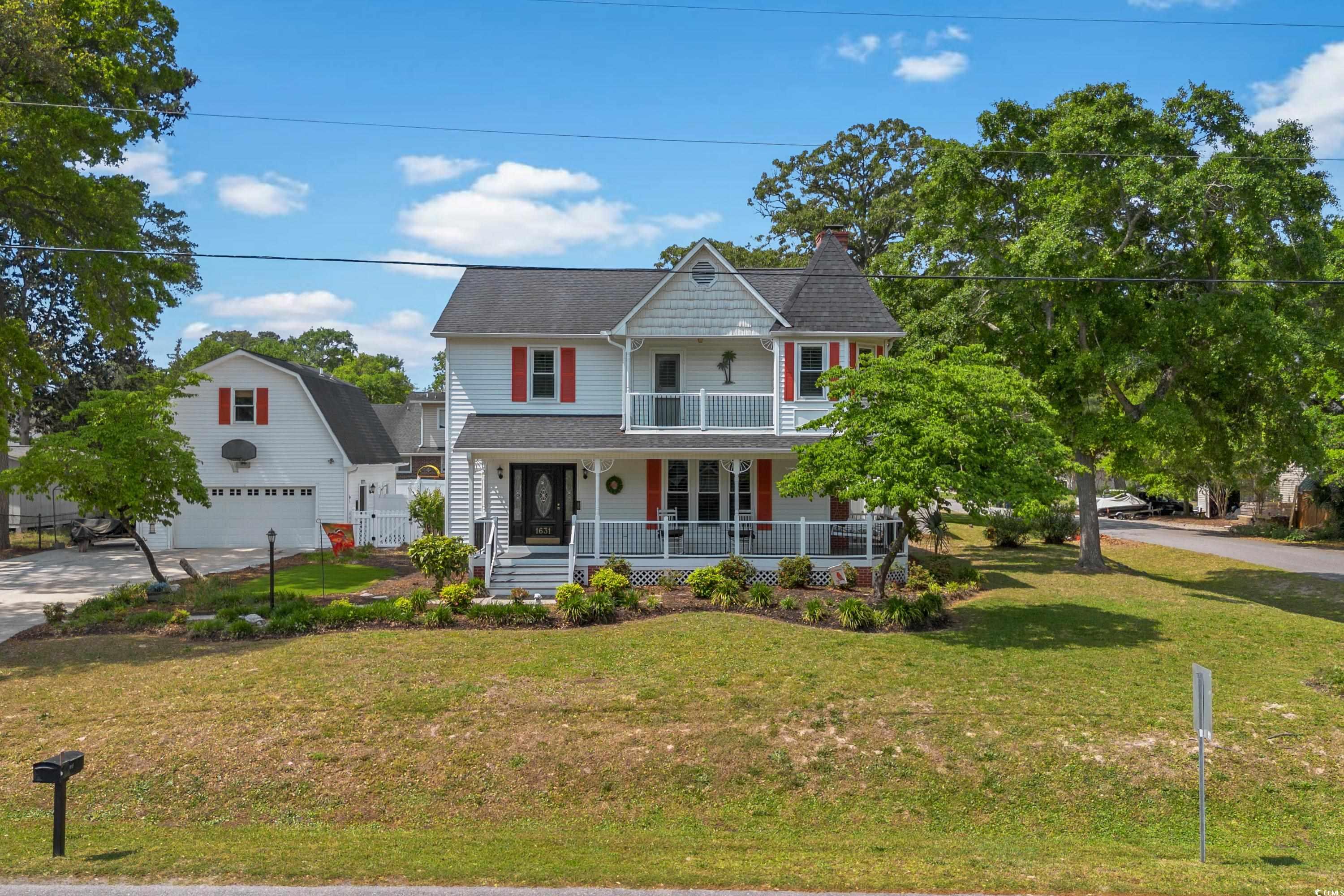 quiet and quaint victorian-style home with low maintenance salt-water pool and detached 2-car garage with upstairs studio apartment in popular established riverside neighborhood with no hoa near icw and just a golf cart ride to the beach. home features plantation shutters, composite decks/porches, new windows, roof, encapsulated crawl space, water heater, and solar panels all added at different times since 2016. all though not used, the fireplace is fully working.  home is being sold furnished. measurements and square footage are approximate and buyer is responsible for verification if wanted.