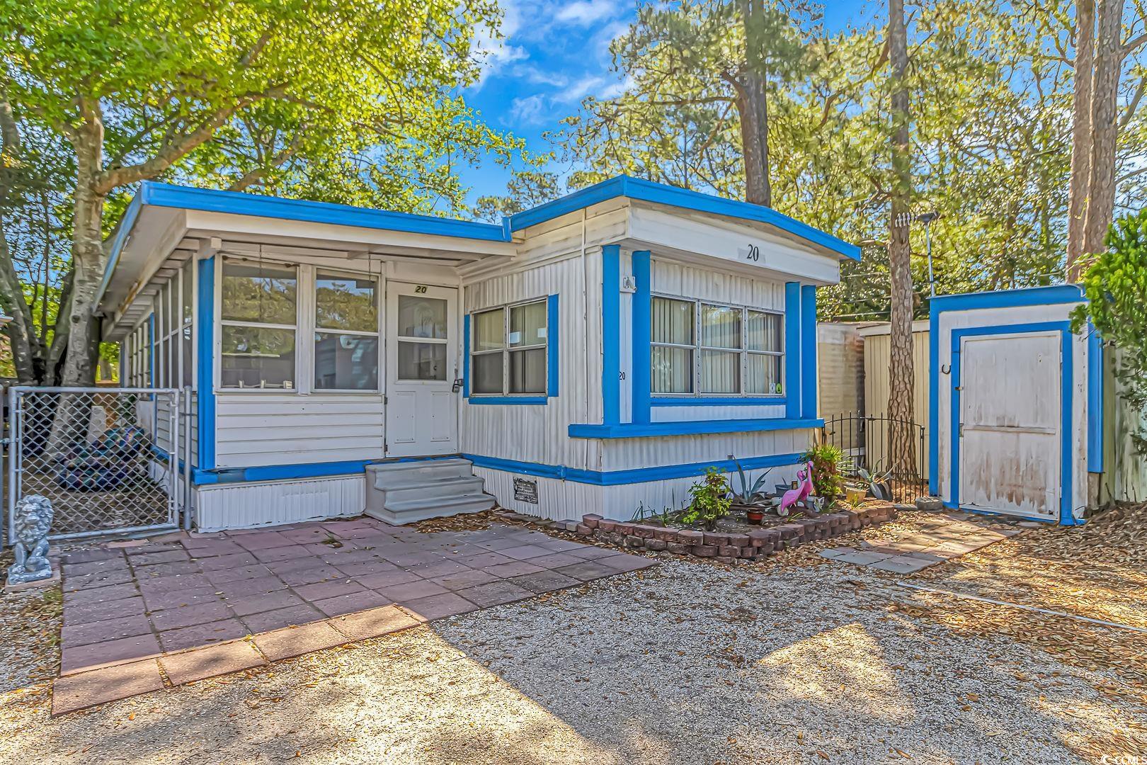 motivated seller. prime location, location, location, in the heart of north myrtle beach, east of hwy 17!!! this charming 2 bedroom/1 bathroom manufactured home on leased land is centrally located in the windy hill section of north myrtle beach. open the door to a tiled carolina room, then enter the property to an open concept living/dining/kitchen and fresh paint throughout. washer and dryer convey and are within the home. close to barefoot landing, restaurants & steps to the beach. lot lease includes: water, trash, sewer, cable & lawn maintenance. great vacation home, primary residence or rental property! won't last long, schedule a showing appointment today! all measurements are not guaranteed, buyer responsible for verifying.