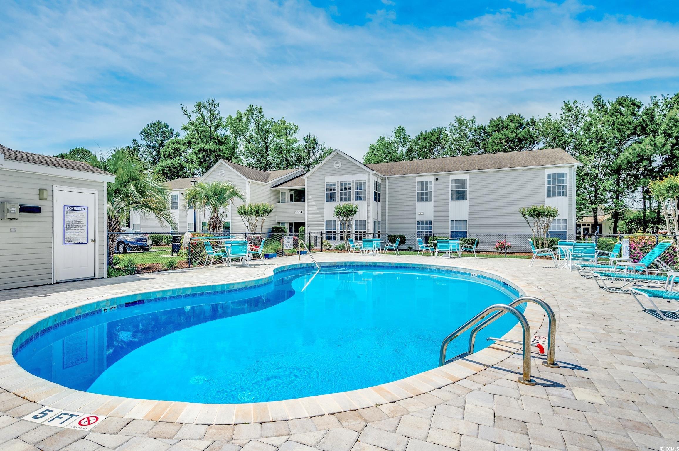 come ride your golf cart to surfside beach from this lovely single-level end unit located in hampton garden villas! this wonderful condo is on the 1st floor so it's easily accessible for everyone. the brand new pier just opened up right down the street and you can enjoy all of the festivals and delicious restaurants on your joy ride! this would be the perfect second home or primary residence. the entire home has been recently remodeled. fresh paint was added throughout along with chair rail molding for a sophisticated touch. there's no carpet in this unit at all. the majority of the flooring is super durable tile and one of the guest rooms has luxury vinyl plank. this condo is great for entertaining because it has an open floor plan with a bar. the kitchen has many new upgrades including: modern shaker-style cabinets, granite countertops, stainless steel appliances, a farmhouse sink, and a custom backsplash. the large owner's suite has two closets, one of them is a walk-in and the other is a nice size. the attached bath has a stylish granite counter with plenty of space for all your essentials. there is a huge laundry room with a rheem hot water heater. the carolina room is a great place to unwind after a long day while you enjoy a good book. it does have a storage room where you can keep your beach necessities and there's a side door where you can walk straight out to the pool! you can take a dip or lounge around in the sunshine. this is a very small community so it feels like your own backyard, but you don't have to maintain it. the hoa covers the common areas, landscaping, water, sewer, trash pickup, insurance, cable, and internet. so, you can just sit back and relax. the new hvac system was installed this month and it comes with a transferrable warranty. most of the windows have been replaced and the lighting has been upgraded. this is absolute paradise! you will be surrounded by palm trees and flowers while you grill out with your friends by the pool. after that, you can have a little fun on the tennis court. owners are allowed to have a pet and a motorcycle. this is a highly desirable location! the murrells inlet marshwalk is close by along with garden city and market common. this area is full of top-notch golf courses, delicious food, fantastic live music, and plenty of places to go fishing. take advantage of the easy life at the beach! schedule your showing today! some photos have been virtually staged. please check out the 3d tour!