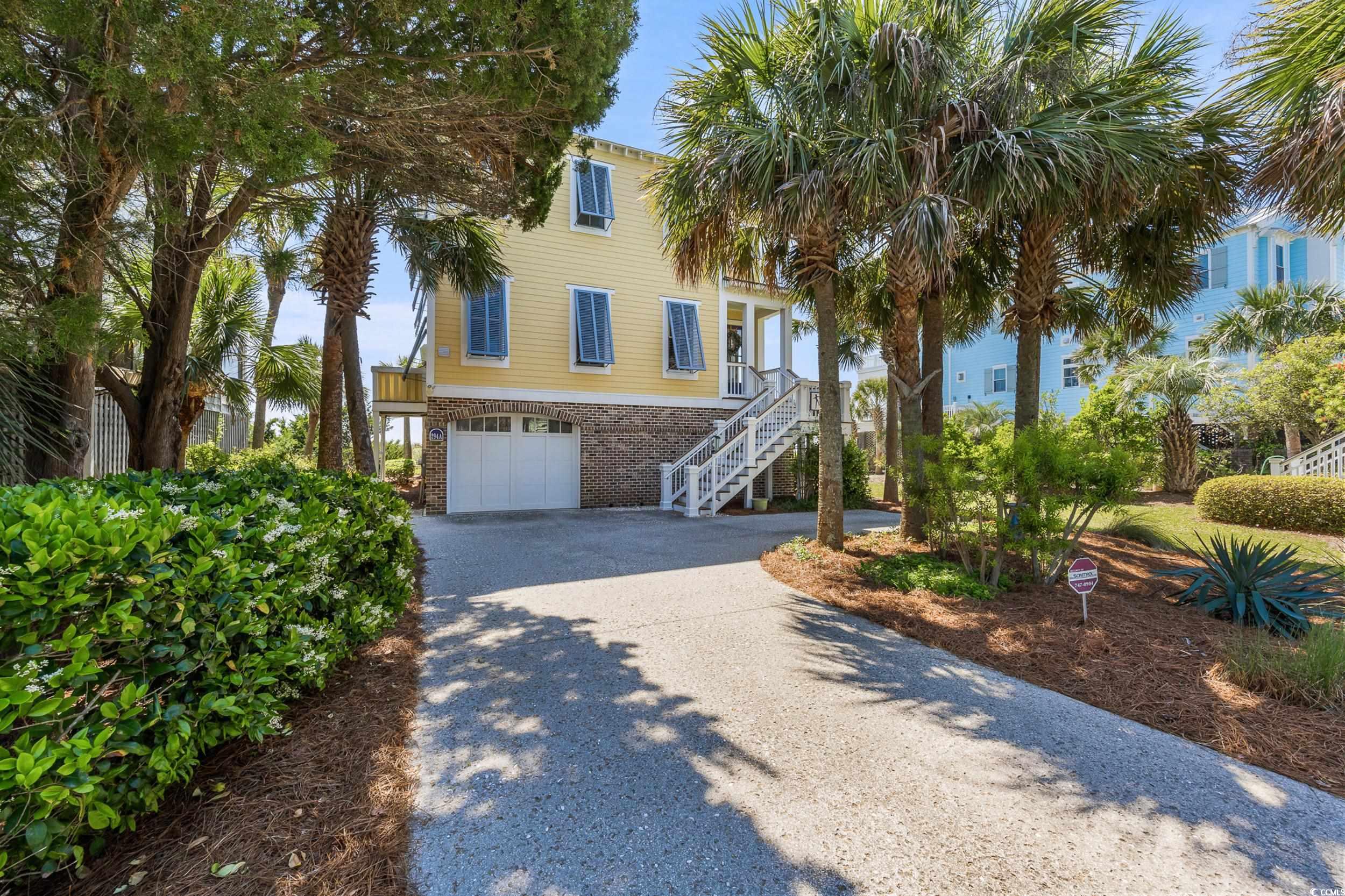 welcome to historical pawleys island! offering panoramic views of the atlantic ocean. this is your opportunity to make lasting memories.  the home is complete with 5 bedroom and 5 en-suite baths plus a 1/2 bath! open floorplan with coastal colors. one bedroom is currently used as an office. the kitchen boasts a wolf 6 burner gas range with two ovens and a grill, farmhouse sink, asko dishwasher, kitchen aid stainless refrigerator, bead board cabinets, natural stone counters and a charming pantry!  recent upgrades include refinished pine floors, new elevator mechanics and first floor sun shades.  the elevator services all floors for easy access. this well constructed home features anderson windows and sliding glass doors, superior crown molding, stacked marble surrounds each gas fireplace, tile in all wet areas, aluminum storm shutters, whole house dehumidifier as well as an attic dehumidifier, automatic closet lighting. the oceanfront main suite features a gas fireplace, sun filter shades and a sumptuous bath complete with rainfall glass shower.  take the spiral stairs to the crows nest to enjoy amazing sunsets.