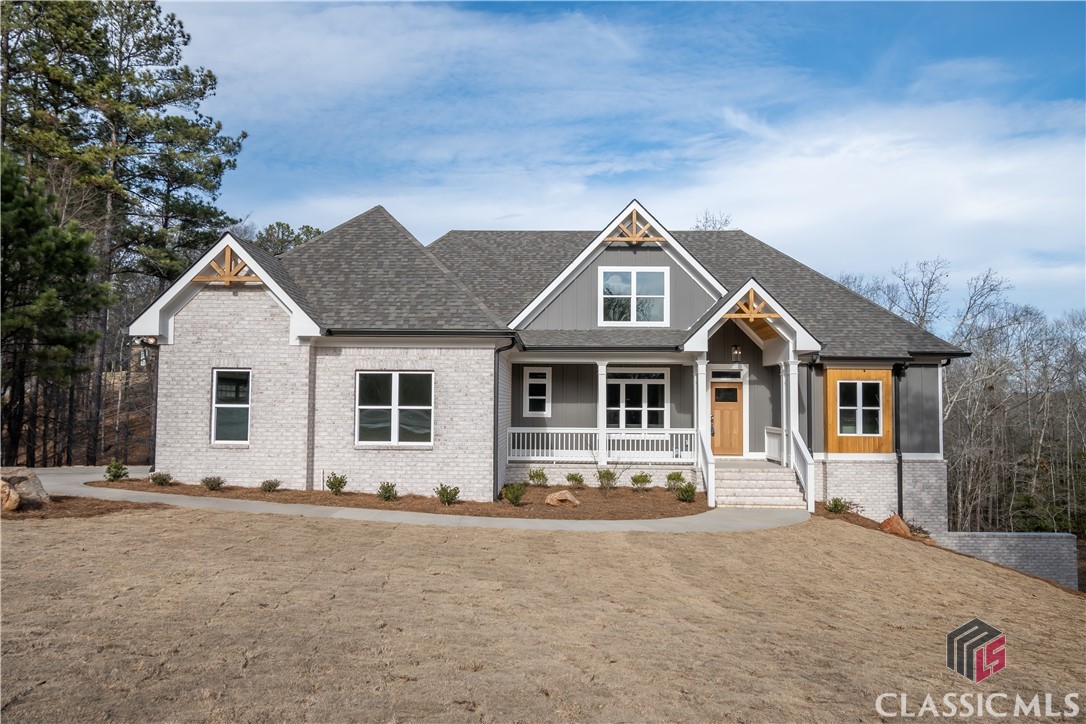 Amazing new construction in wonderful Oconee County. Offering 5 bedrooms/3.5 baths, 3000sqft, in a great location just 4 miles to downtown Watkinsville. Master on main with a large walk-in closet and ensuite bath featuring a freestanding soaker tub, custom tile shower, double vanities & granite tops. Two more bedrooms can be found on the main as well as another full bath and 1/2 bath, an open kitchen, living room, dining room, and laundry. The chef's kitchen with breakfast room features gorgeous custom cabinets, an island, granite counter tops and a generous stainless steel appliance package. Kitchen and living areas have hardwood floors, tile in all baths, and the bedrooms feature upgraded carpeting. Upstairs features 2 more bedrooms, an open loft type area, and a full bath. All this over a full unfinished basement. Perfect floor plan for entertaining and families with children. Exterior features include covered front and back porches, Hardiboard construction, beautiful landscaping, sod and irrigation system. Now is the time to personalize this home by choosing all your favorite colors. Don't miss out on this one! *Floor plan has been modified from the one pictured*