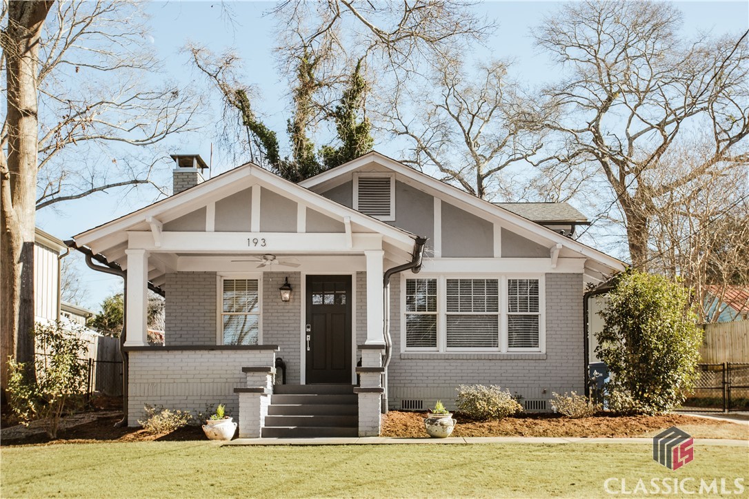 This is a fantastic, unique opportunity on one of Athens's best streets. This adorable Craftsman home was lovingly renovated in 2015 and has been very gently lived in. The open concept living / dining / kitchen offers great spaces for gathering with generously sized rooms. The owner's suite is on the main with a fully updated beautiful bathroom and custom built closet. Upstairs are two spacious bedrooms with hall access bath. Off the rear of the home is a covered patio perfect for watching the game and grilling with friends. But, one of the most unique features of this home is with the fully-functioning additional cottage at the rear. This adorable studio has a full kitchen, great storage, and a great living space with plenty of light. The yard has room for a garden and plenty of off-street parking. This home offers so many different opportunities and is just outside of the historic district for ease of modification.