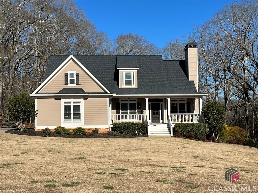 Welcome to 1910 Mcrees Mill Road, a charming 5-bedroom, 4-bathroom home in Watkinsville, Georgia. Built in 2016, this well-maintained property sits on a private 3.59-acre tract, fenced with a barn ideal for a small farm or horses. The main level offers 3 bedrooms and 2 bathrooms, including the master suite. The kitchen features granite countertops and stainless steel appliances. A full length screened porch is accessible from the kitchen and primary bedroom offering a peaceful retreat to relax. Upstairs, find another bedroom, bathroom, and a versatile bonus room for a private suite. The lower level is finished and could be a separate living space with 1 bedroom, 1 bathroom, a kitchen, living room, and exterior access. Currently there is also a large dental lab in the lower level that could be perfect for an office, home gym, or just flex space. Enjoy the blend of modern living and rural charm at 1910 Mcrees Mill Road, where convenience meets tranquility in Oconee County!