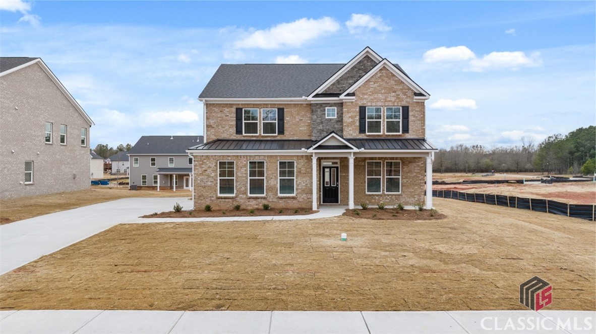 Welcome home to beautiful Oconee County HAMPSHIRE PLAN located in the highly sought after North Oconee school district. New construction community, Westland, on Hwy 78 just minutes from Athens and 5.8 miles from HWY 316 & 23 minutes from UGA! You will feel right at home entering in your large dining room with coffered ceilings, perfect for formal dinners. The Hampshire plans has open concept family room & kitchen with Kitchen Cafe informal dining and large island with Quartz countertops. Exceptional 3-SIDE BRICK- SIDE ENTRY GARAGE- CORNER LOT! In-law suite on the main with full bathroom. Enjoy your private bedroom suite with sitting room luxury bath with soaking tub, large bedroom closet to accommodate all seasons.  Plus, bonus Loft/Rec Room space upstairs perfect for family game nights. Your new home is built with an industry leading suite of smart home products that keep you connected with the people and place you value most. Photos used for illustrative purposes and do not depict actual home.