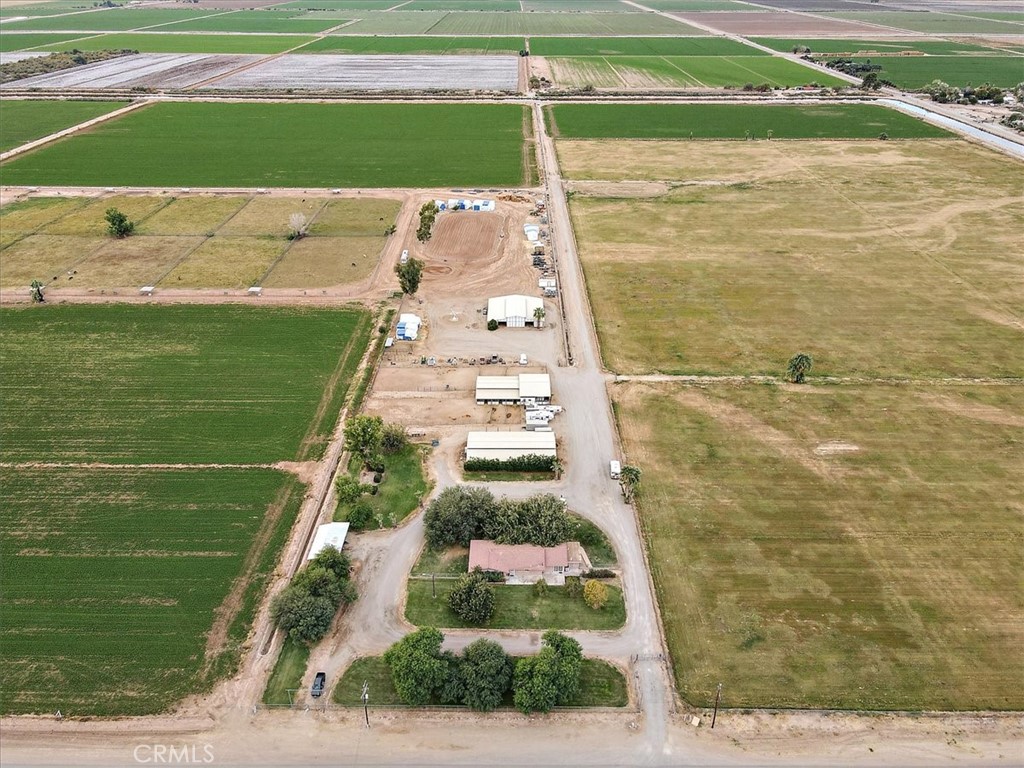 Arial of bermuda to left and alfalfa to right of ranch area