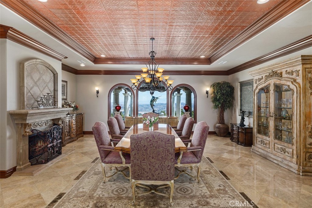 Formal dining area with panoramic views.
