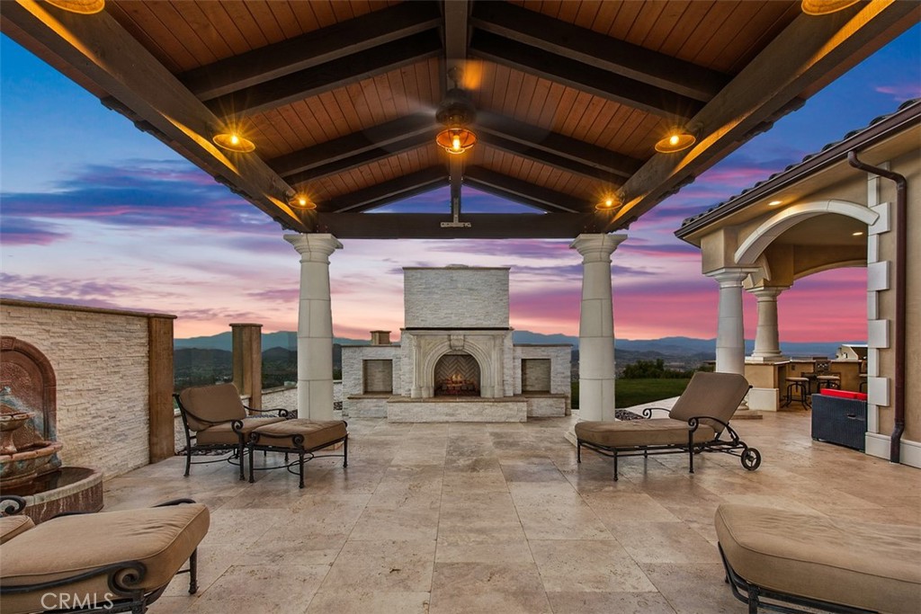 Private covered second patio with views.