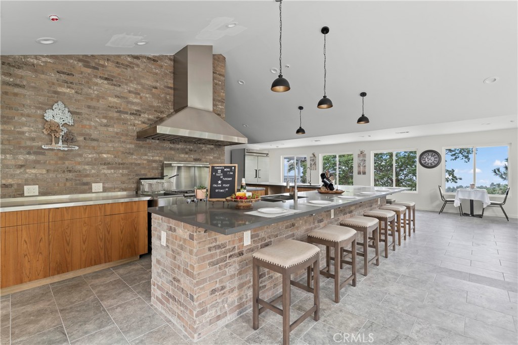 Enormous chef's kitchen with 10 seat island
