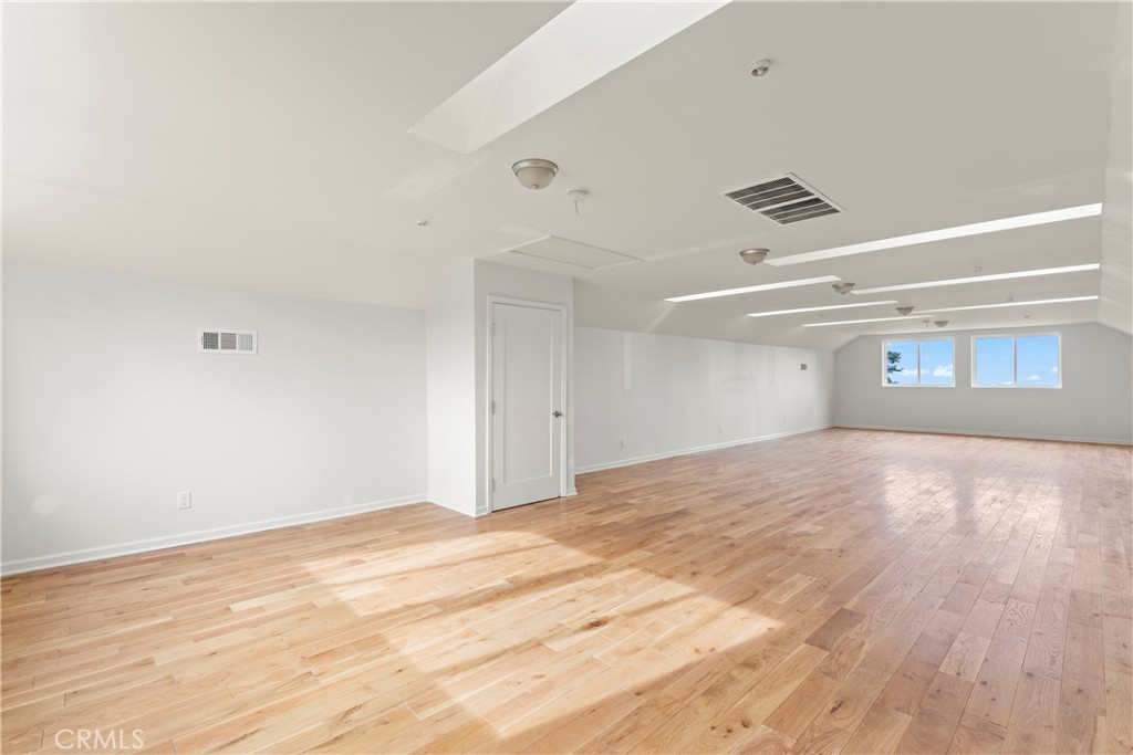 Large room with skylights and distant views