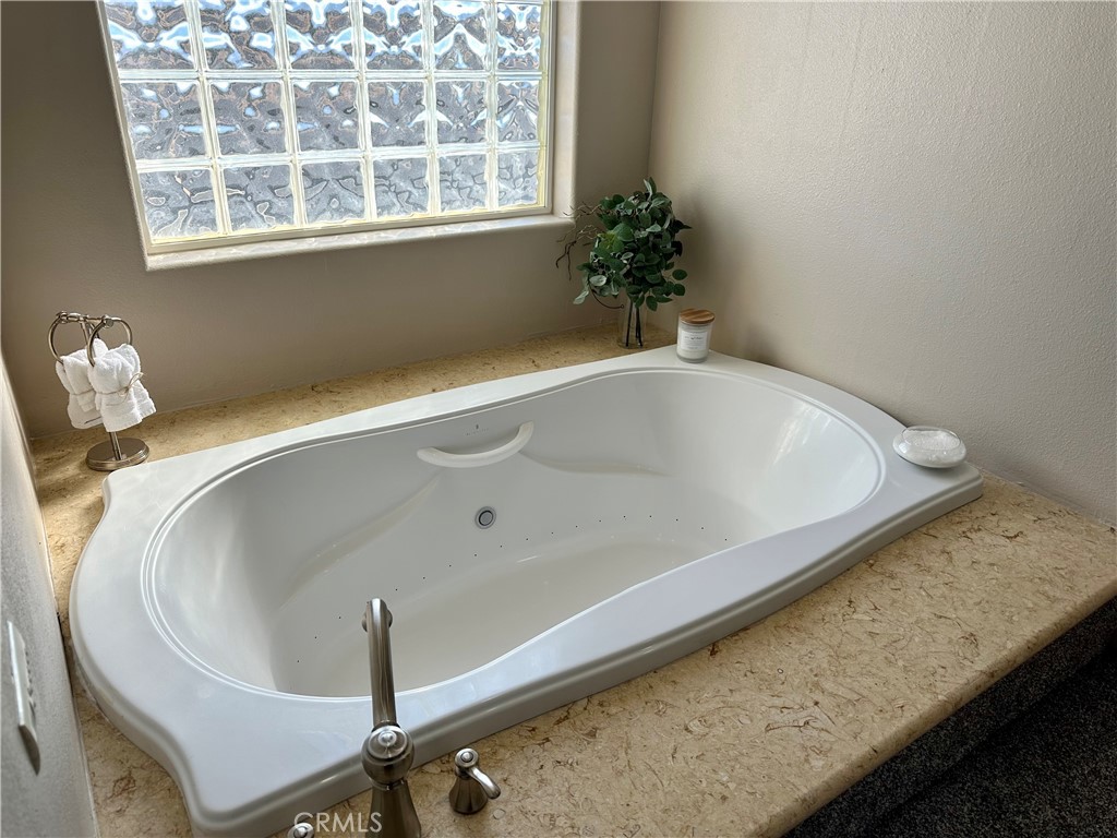 Air jetted bathtub with colored light system
