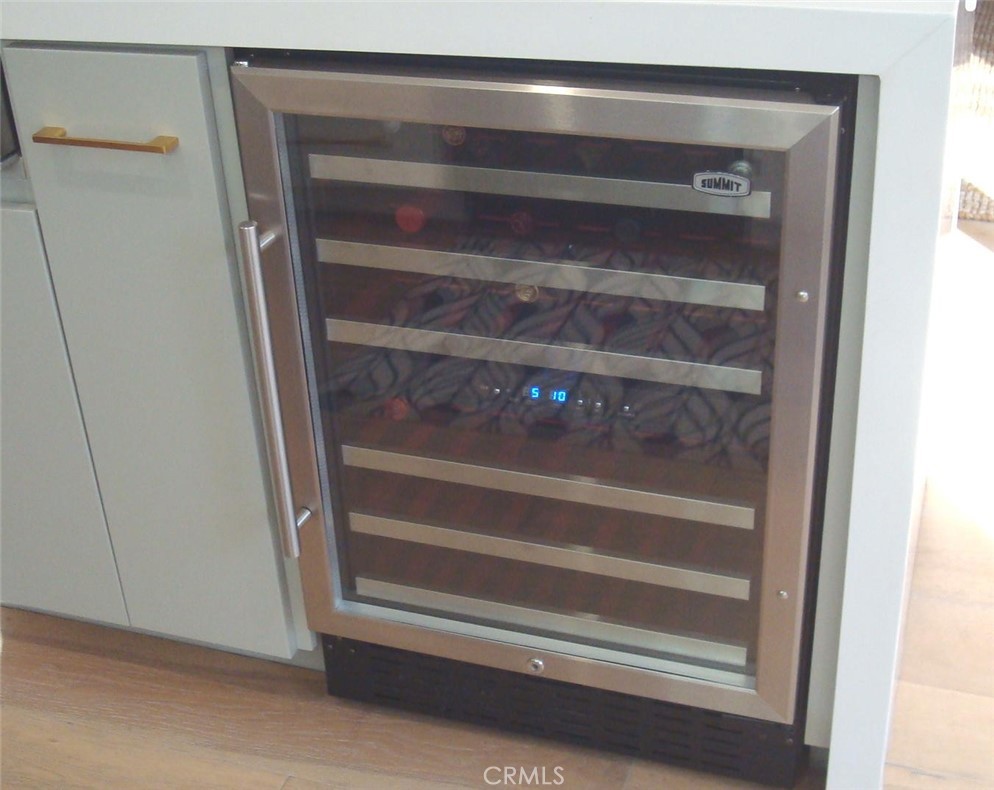 Wine cooling cabinet by Summit in kitchen
