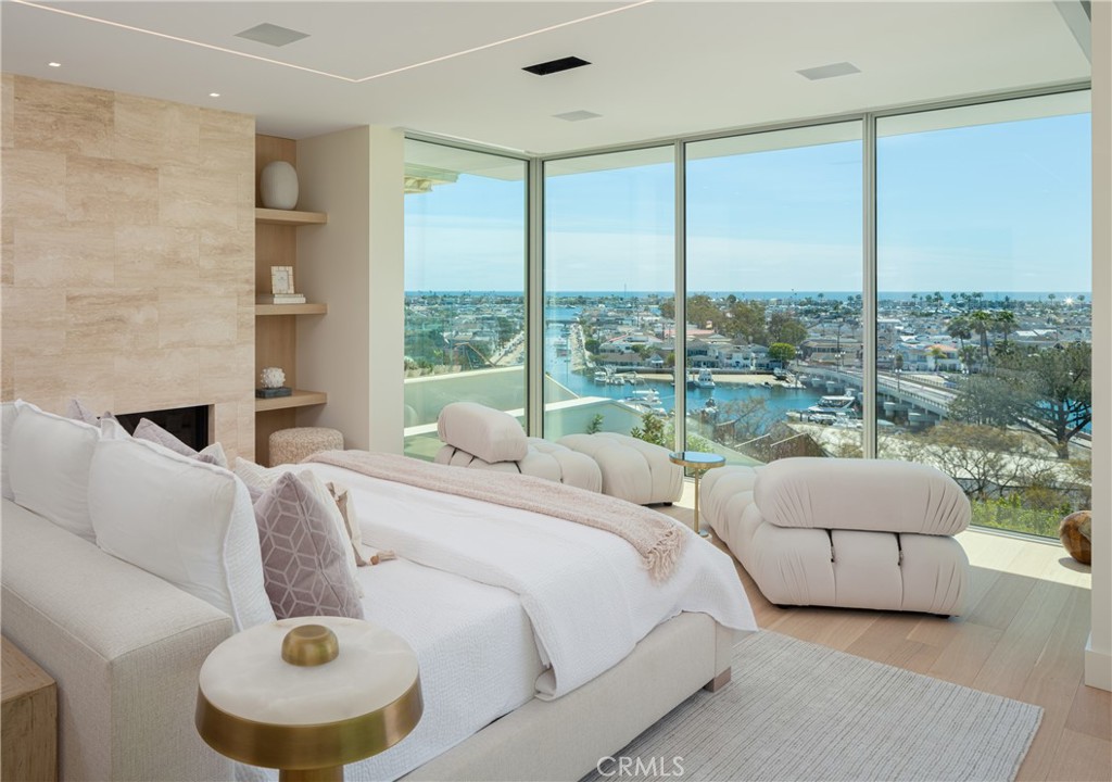 Main level Primary suite with floor to ceiling windows