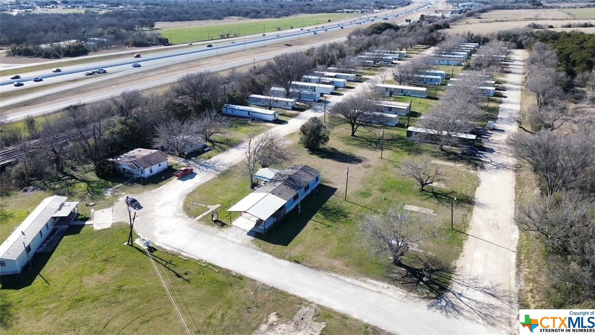 Discover the perfect blend of serenity and convenience in this expansive mobile home park on over 11 acres with 57 thoughtfully designed spots for mobile homes. Kickstart your income seamlessly with the inclusion of 29 mobile homes that will convey with the land. Enhance the diversity of your portfolio with an additional 7.25 acres of land zoned for multi-family properties. This comprehensive package invites you to not just buy a mobile home park but to embark on a real estate venture with boundless potential. (MLS#531607 will be included)
