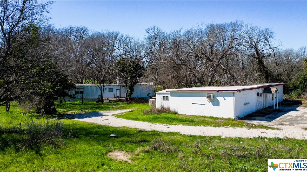 Exciting news for investors and potential buyers looking for commercial property in Seguin, Texas. This half-acre property offers a unique opportunity with its zoning split between commercial and residential use. The back portion, approximately 0.223 acres, is grandfathered as residential land and features a manufactured home. The front half of the property is zoned for commercial use at .224 acres, making it ideal for various business ventures.
One of the standout features of this property is its location overlooking I-10, providing excellent visibility and exposure to passing traffic. The proximity to this major highway offers great potential for businesses looking to attract customers and clients. Whether you're a commercial real estate investor or searching for a property to call home, this listing has something for everyone. Don't miss out on the opportunity to own a versatile piece of land in Texas in a charming city known for its rich history and vibrant community.