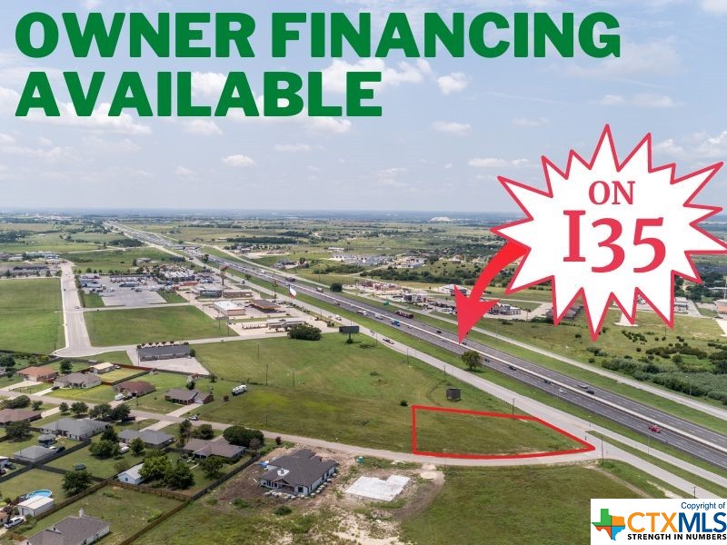 OWNER FINANCING AVAILABLE...  Least expensive I35 frontage available between Austin and Temple. Hard corner on almost an acre of I-35 frontage in a very visible location.  This property is vacant and is ready for your project.  The property is zoned C-2 and has water and sewer available.  This site could be retail, fast food, medical office, townhouse, office space, carwash, etc.