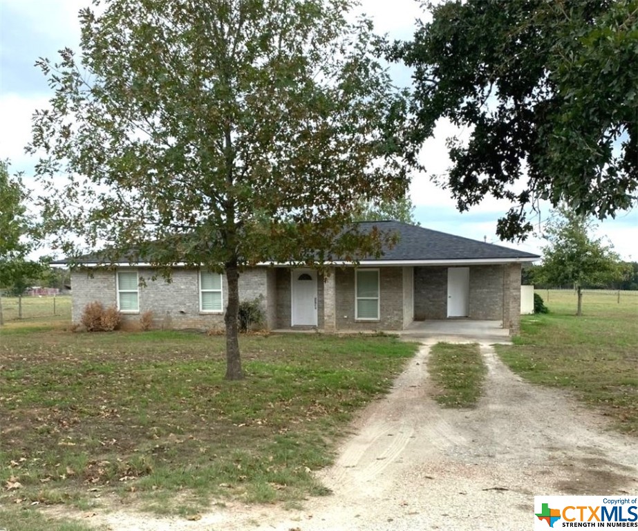 Welcome to 978 Holly Cemetery Rd!  If you are seeking the serenity of country living with modern comforts surrounded by larger tracts of land, this property may be for you!  This very clean, brick home offers 2 bedrooms, 1.5 bathrooms with approximately 1,096 sq ft of living space, laminate wood & tile flooring throughout complemented by plantation shutters in every room.   An attached carport provides convenience, while a storage building offers extra space for your needs. The highly desirable Franklin ISD ensures your educational pursuits are well catered for.  Enjoy the beauty and recreational activities of nearby Lake Limestone. Close proximity to College Station, Centerville, and Waco with easy access to I-45, placing both Dallas and Houston within a 2½ hour drive.  Schedule your viewing as soon as possible!