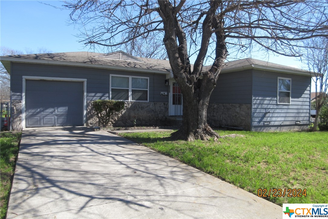 Corner lot property located within minutes of THE Airfield gate.  Home offers 3 bedrooms, 1 bath and 1 car attached garage. Kitchen includes a dining area.  Washer and dryer connections in the garage. Garage includes a door that leads to the backyard.