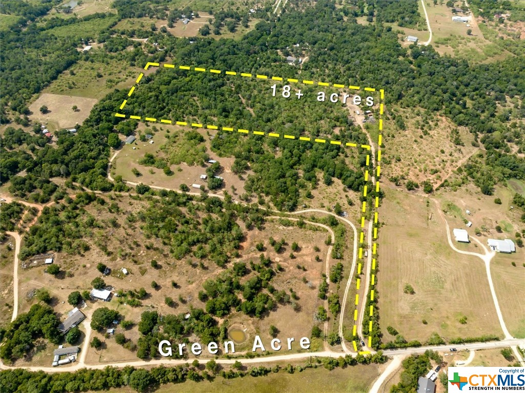 Over 18 acres of privacy!!! Just minutes from Lockhart and a short commute to Bastrop makes this property a perfect primary residence, weekend getaway, or buy and hold investment! This flag shaped lot is located down a quiet gravel road and has several home sites. Manufactured homes are OK! Native trees and grasses along with an AG exemption make this a great option for livestock, bees, or 4H/FFA animals. HUGE BONUS--property has a well and electricity in place. Septic needed. Storage shed on property conveys. Come enjoy a slice of country life!