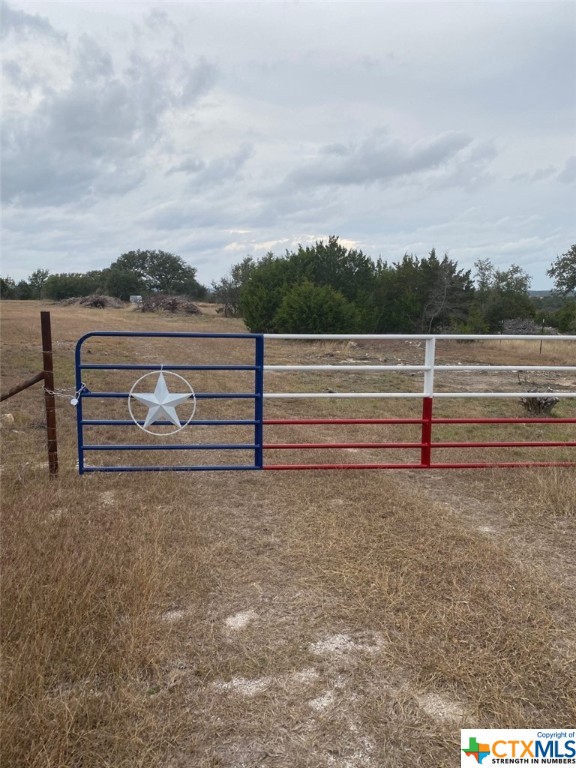 Own a piece of the Texas hill country! This 10.5 acres has beautiful views. There are many potential building sites. The property has been partially cleared, uncovering some beautiful hardwood trees. There is electric on the property. A water well or rain collection and a septic system will be required. Call for an appointment today.